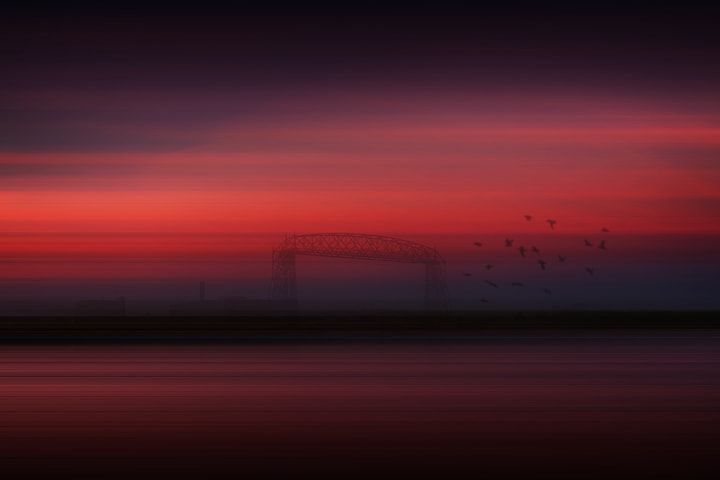 Canon EF-S 18-55mm F3.5-5.6 sample photo. Pink sky, blue water photography
