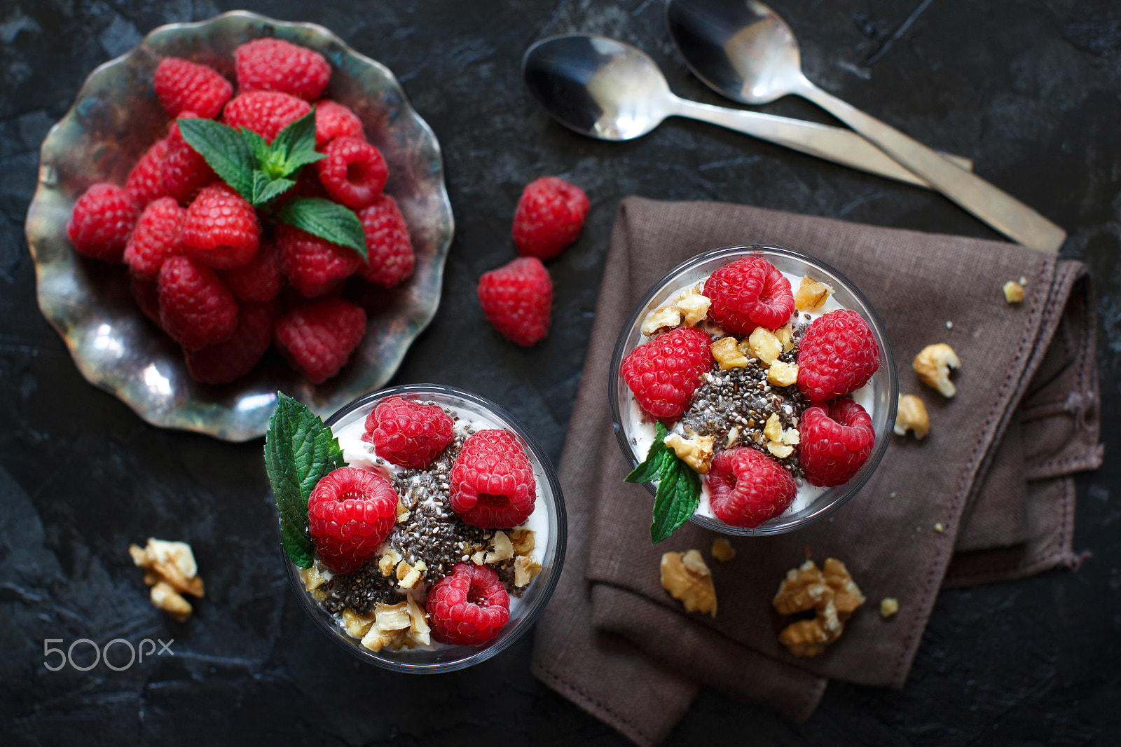 Canon EOS 650D (EOS Rebel T4i / EOS Kiss X6i) + Canon EF 50mm F1.2L USM sample photo. Yogurt with chia seeds, walnuts and raspberries photography