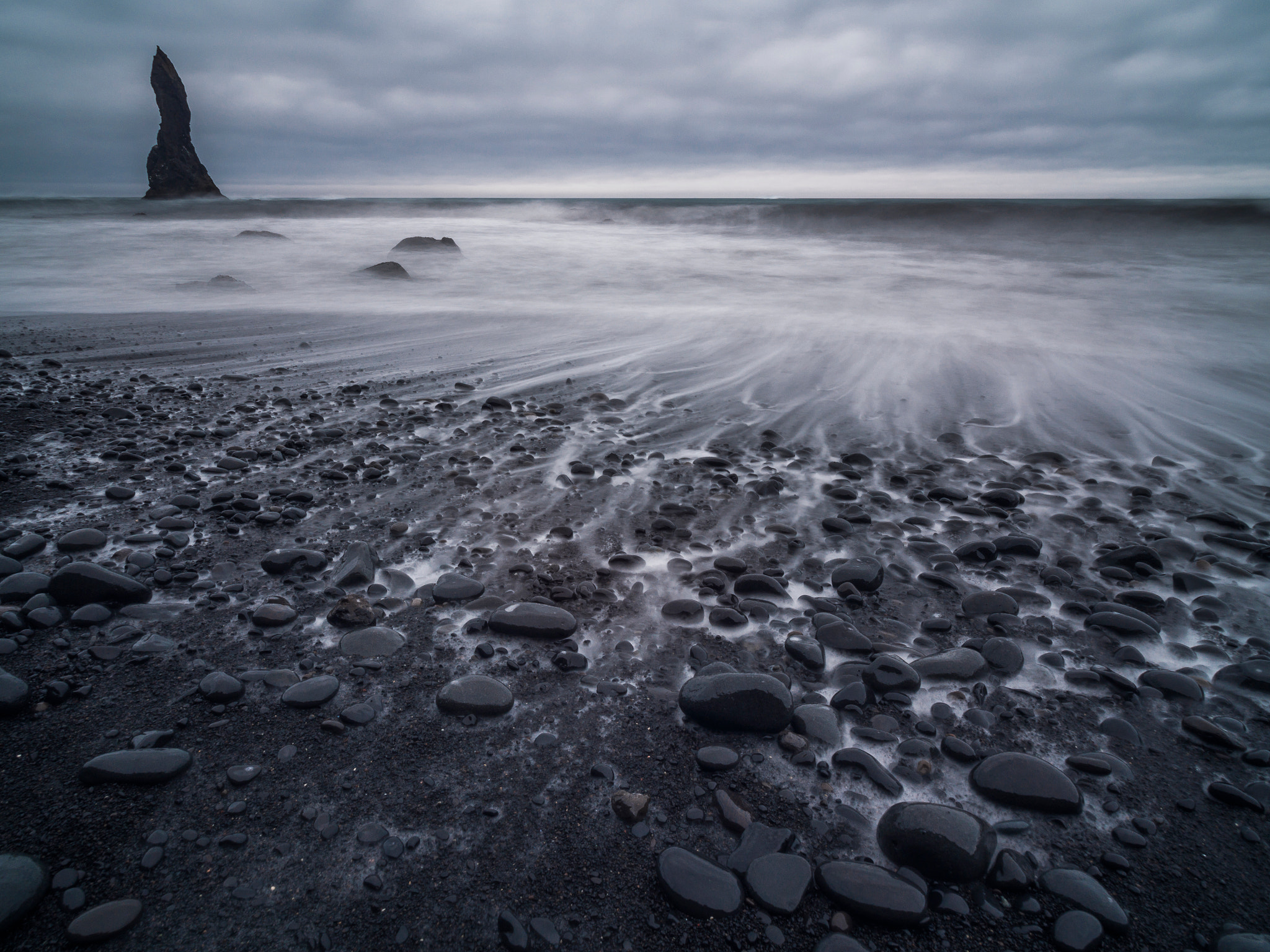 Olympus OM-D E-M5 + Olympus M.Zuiko Digital ED 7-14mm F2.8 PRO sample photo. Black sand beach in iceland. photography
