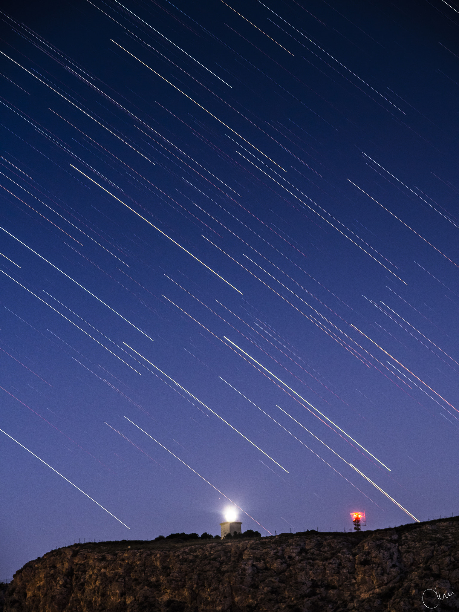 Olympus OM-D E-M10 + OLYMPUS 14-54mm Lens sample photo. Stars over the lighthouse photography