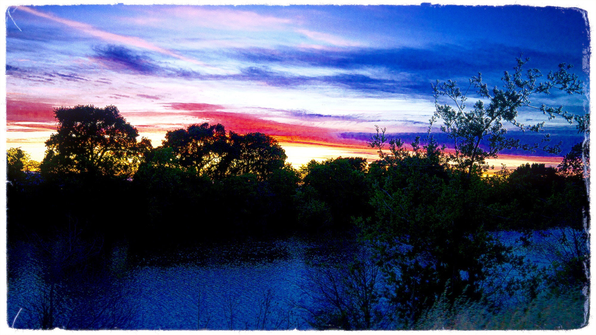 Panasonic Lumix DMC-GX1 sample photo. Sunset on steamboat slough in the california delta photography