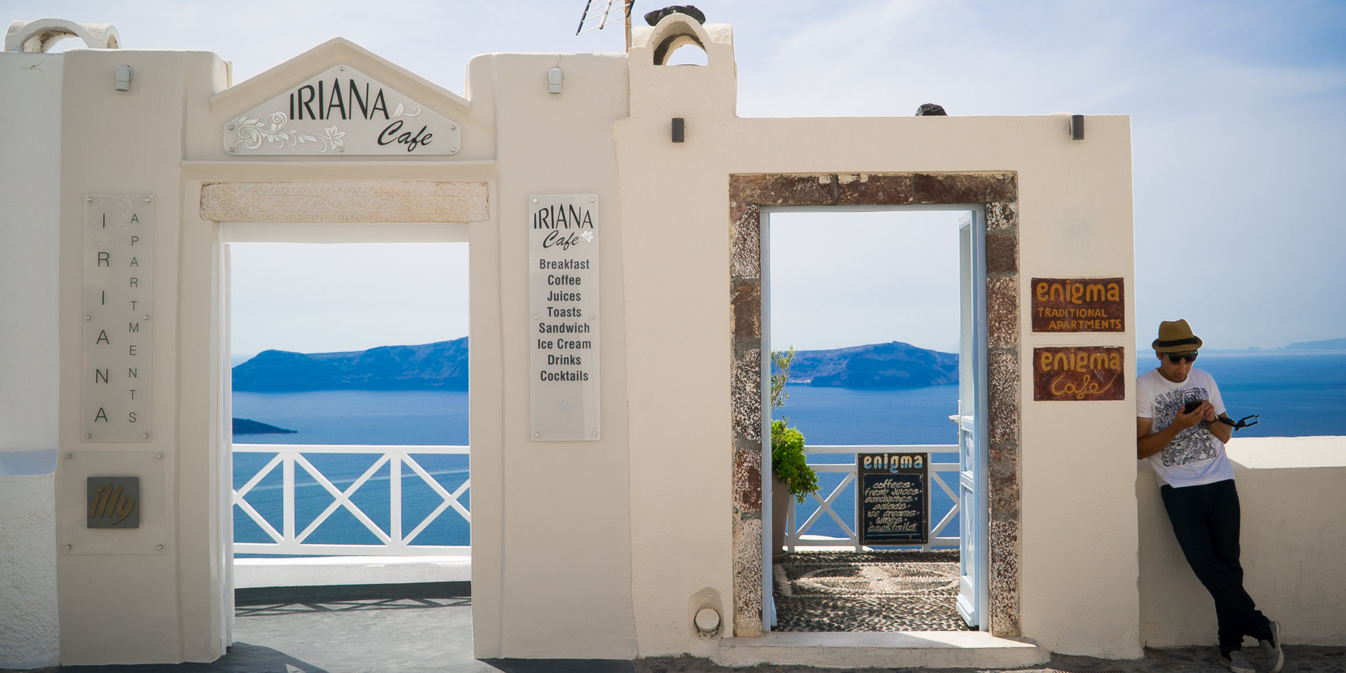 Sony E 18-200mm F3.5-6.3 OSS sample photo. Street view of fira photography
