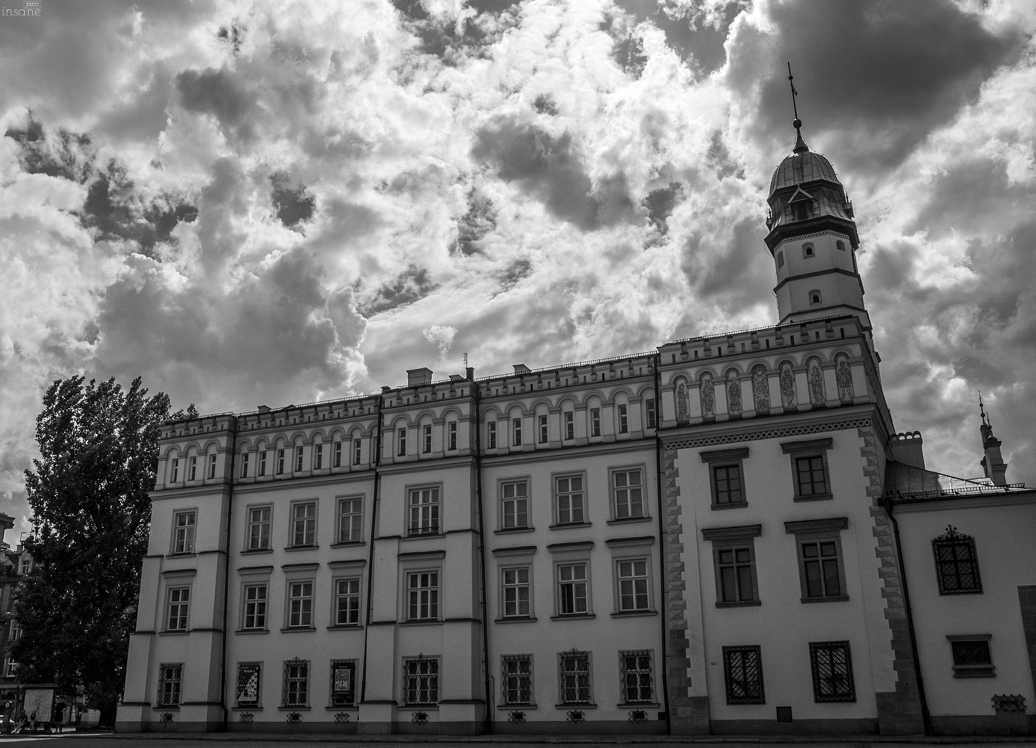 Panasonic Lumix DMC-GX7 + Panasonic Lumix G 14mm F2.5 ASPH sample photo. Clouds above building photography