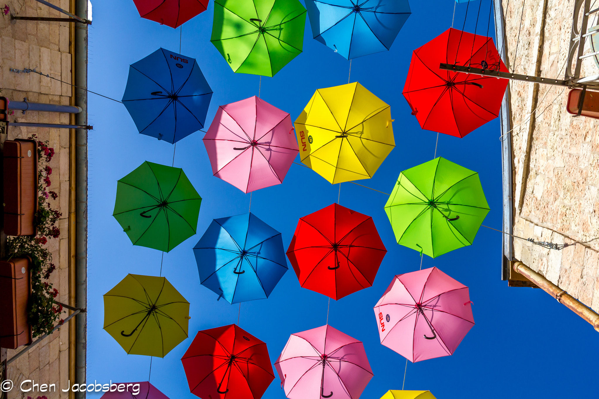 Canon EOS 550D (EOS Rebel T2i / EOS Kiss X4) sample photo. Umbrellas in the sky photography