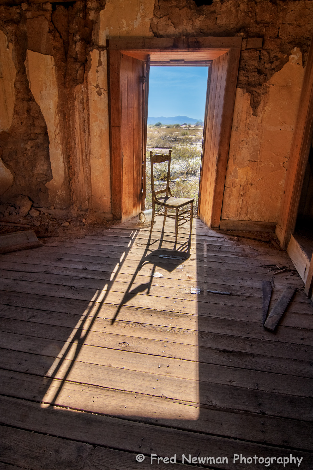 Canon EOS 40D + Tokina AT-X Pro 12-24mm F4 (IF) DX sample photo. Chair by the doorway photography