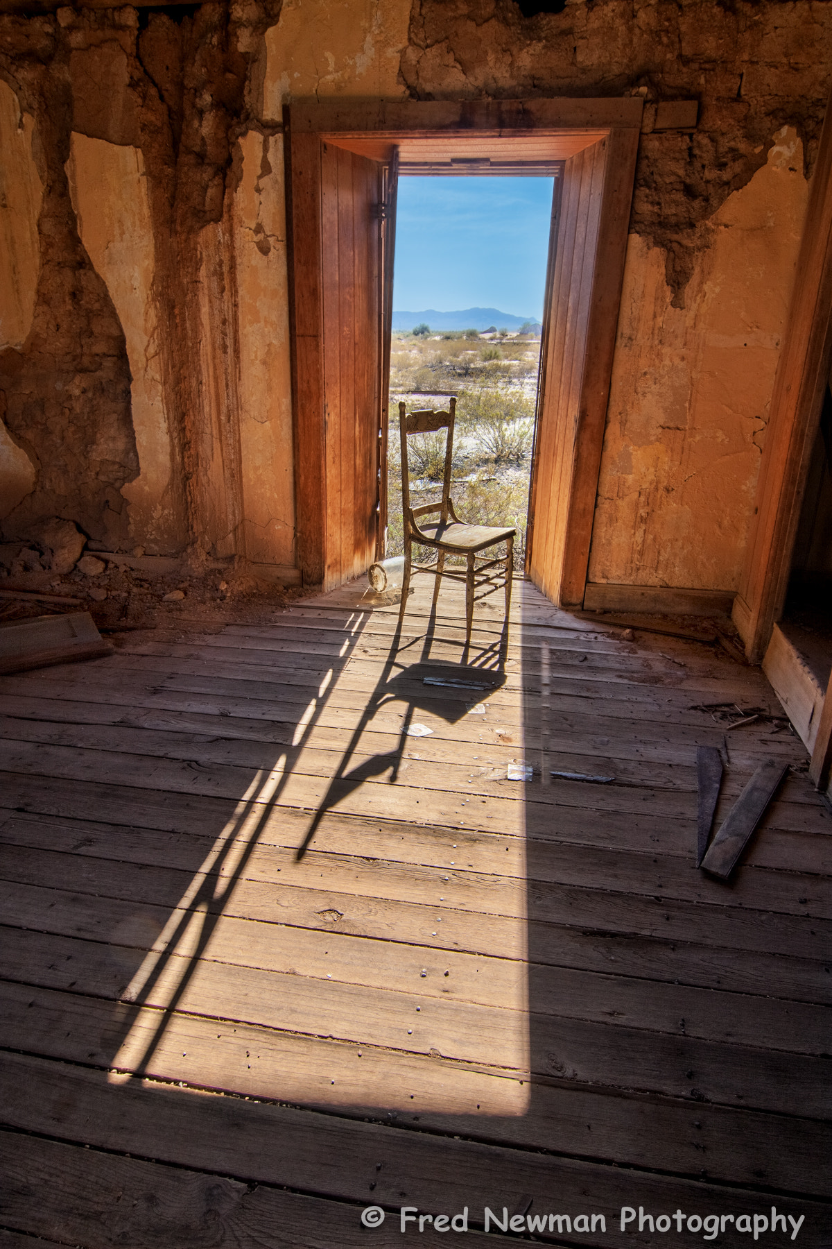 Tokina AT-X Pro 12-24mm F4 (IF) DX sample photo. Chair by the doorway photography