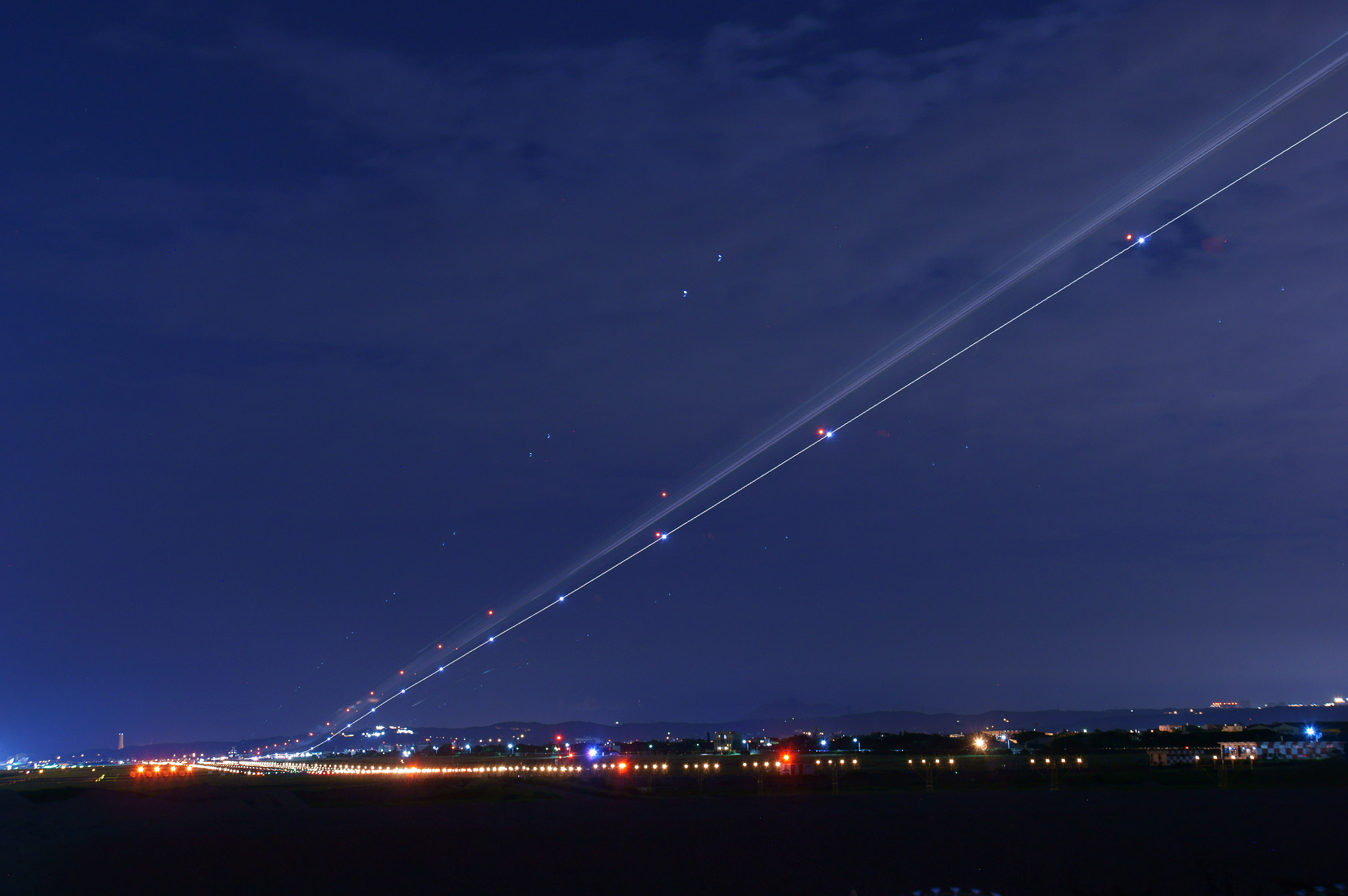 Sony E 18-55mm F3.5-5.6 OSS sample photo. Airplane track photography