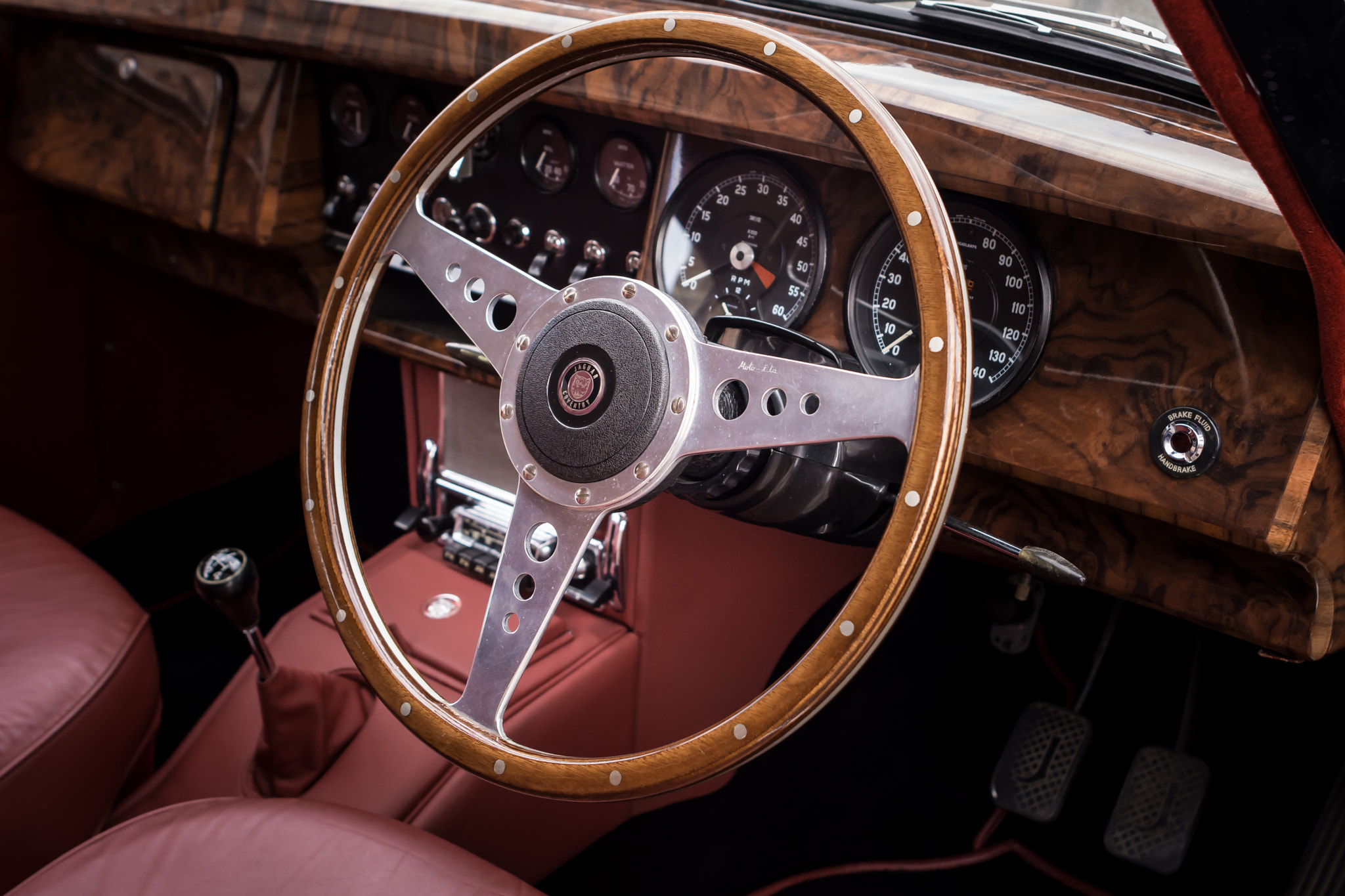 Nikon D7100 + Nikon AF Nikkor 24mm F2.8D sample photo. Moto lita - vintage steering wheel photography