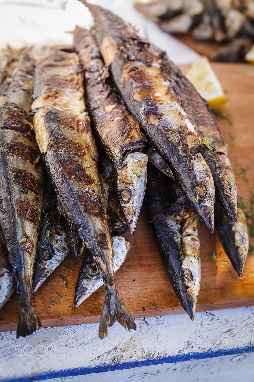 Canon EF 50mm F2.5 Macro sample photo. Fresh fried fish on a baking sheet photography