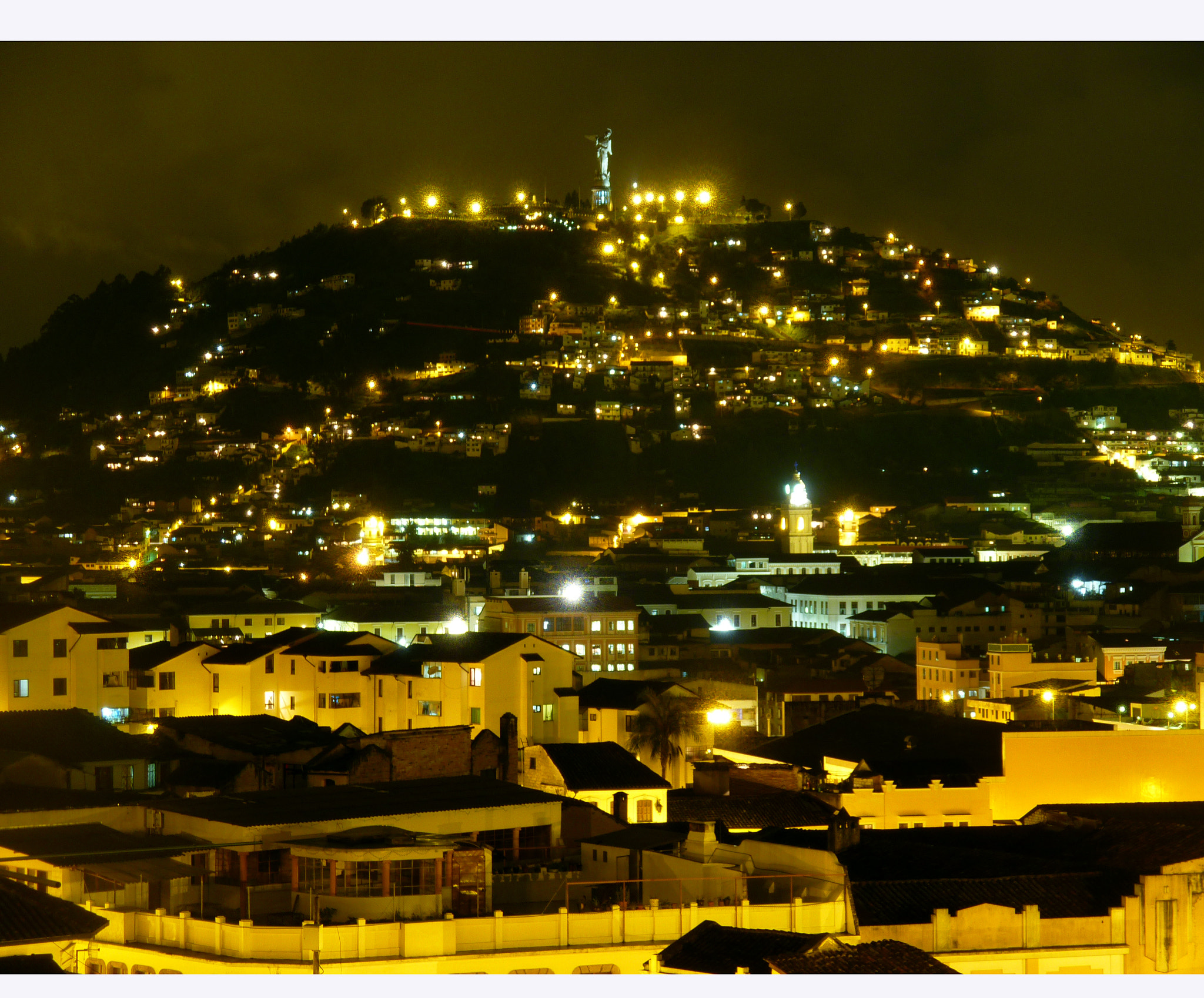 Panasonic DMC-ZR1 sample photo. Winged virgin mary on panecillo hill at night photography