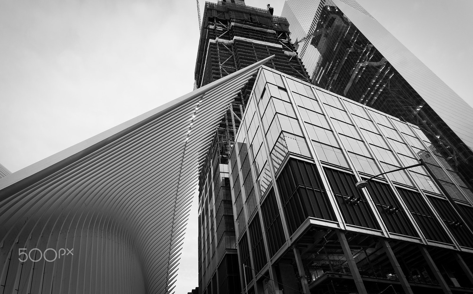 Sony Alpha NEX-5R + Sony E 16mm F2.8 sample photo. New york's oculus' roof and near skycrapers. photography