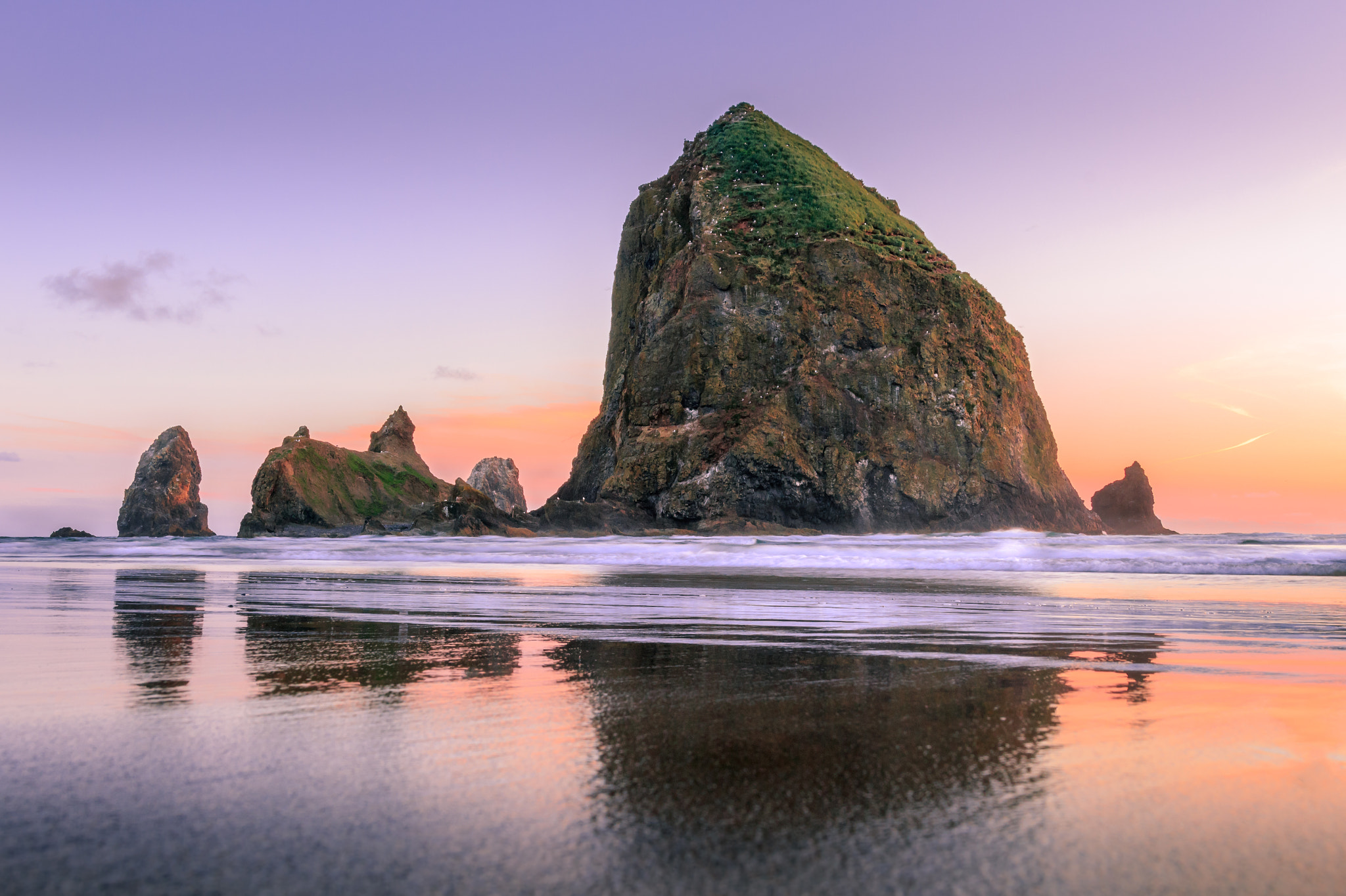 Canon EOS 100D (EOS Rebel SL1 / EOS Kiss X7) + Sigma 18-35mm f/1.8 DC HSM sample photo. Sunset at cannon beach, or. the site of the goonies. it's almost surreal when the sun goes down. photography