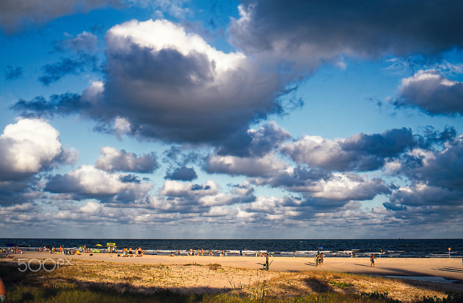 Samsung NX300 + Samsung NX 30mm F2 Pancake sample photo. Clouds over sand and sea photography