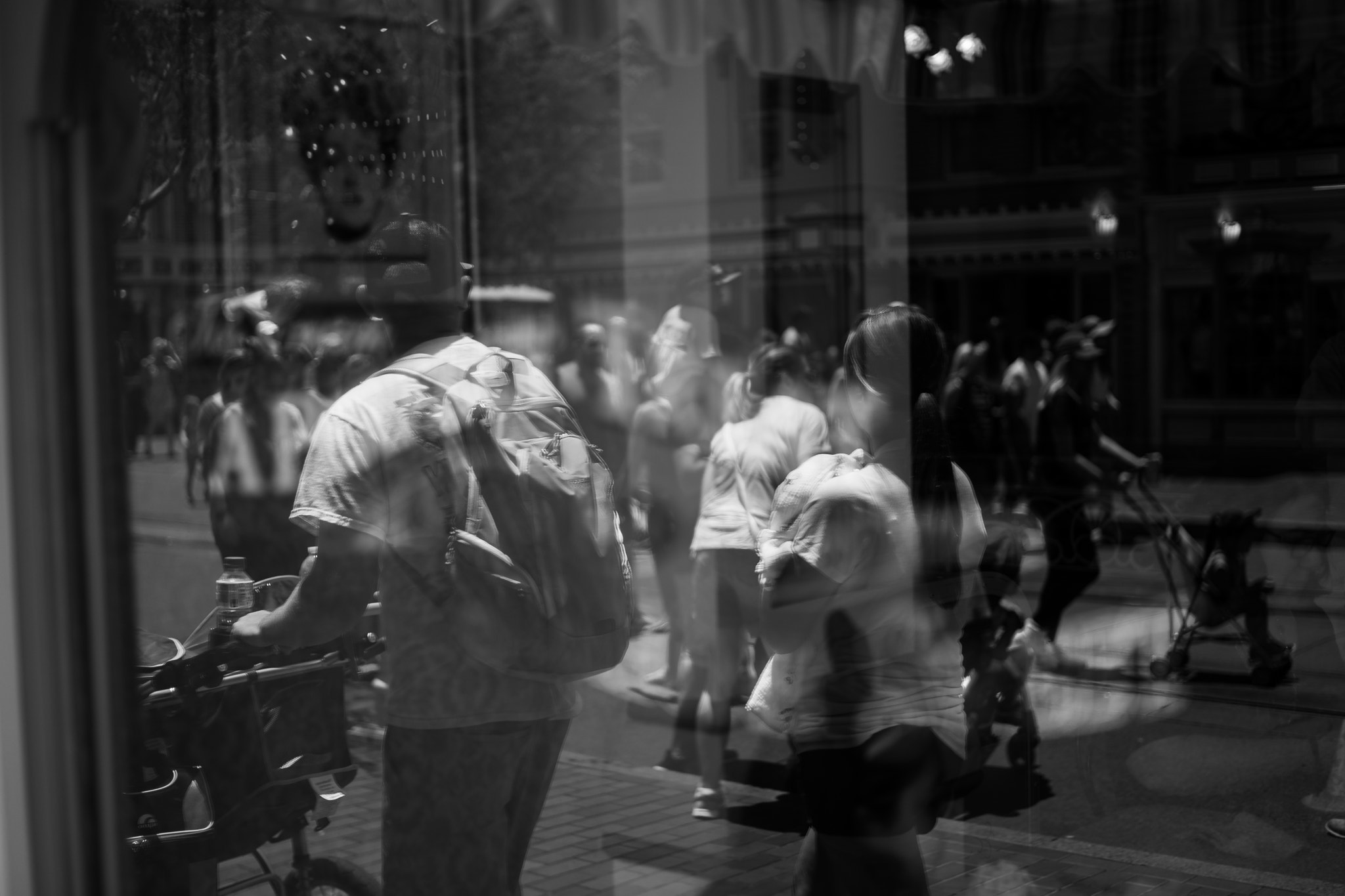 E 50mm F2 sample photo. Walking on main street photography
