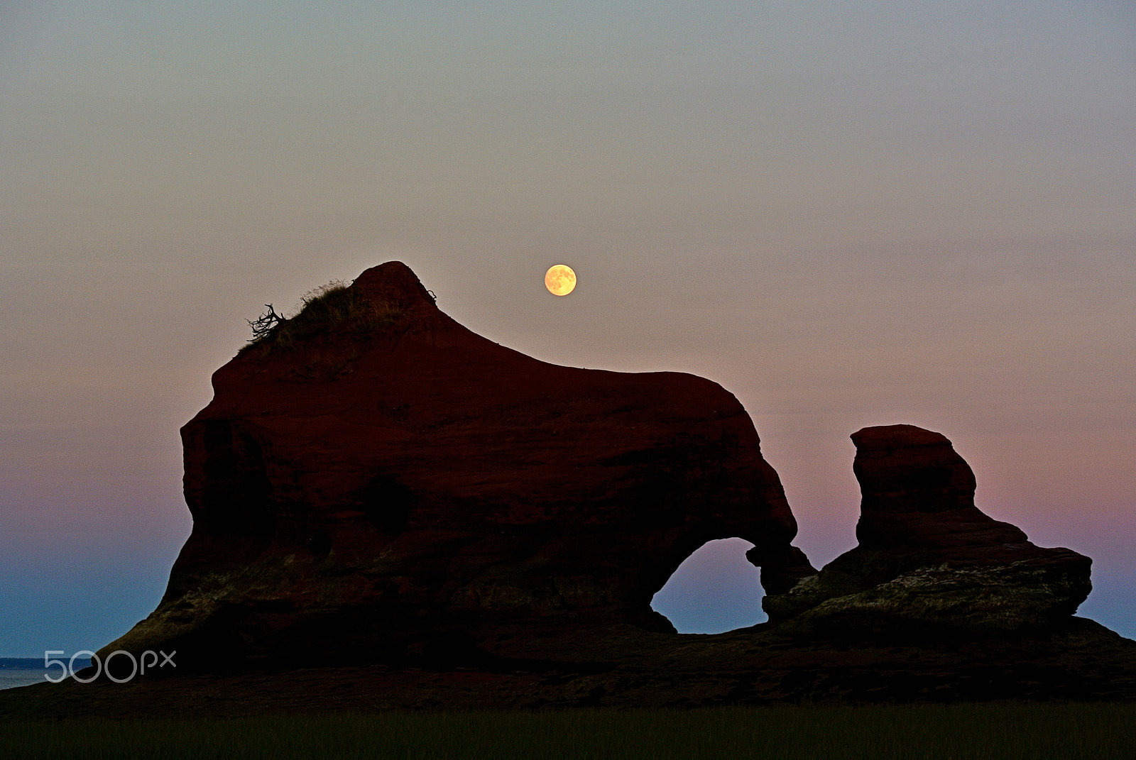 Nikon 1 Nikkor VR 30-110mm F3.8-5.6 sample photo. Moonrise over sea stack and arch iii photography