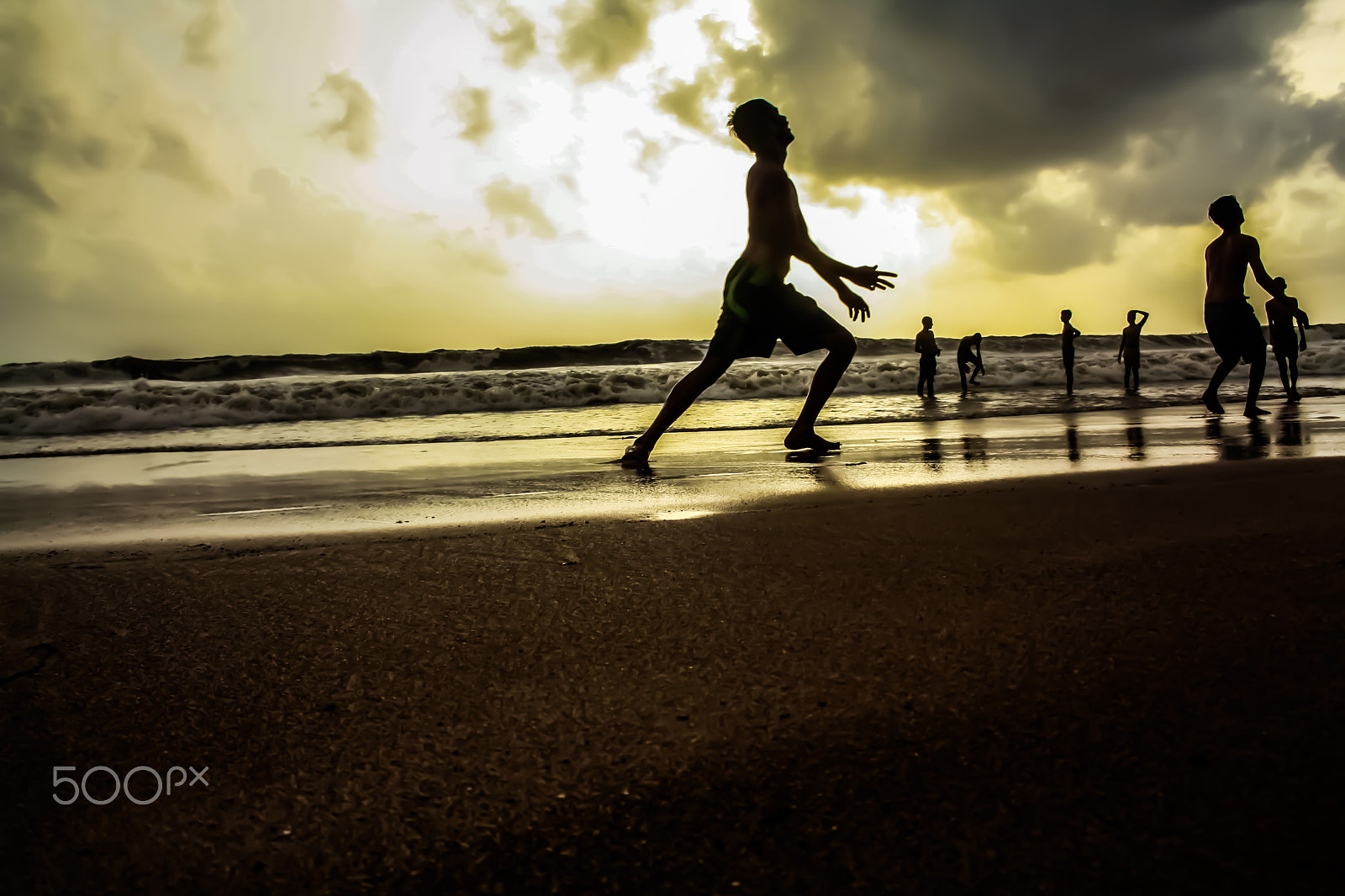 Canon EF-S 18-55mm F3.5-5.6 sample photo. Playtime on the beach photography