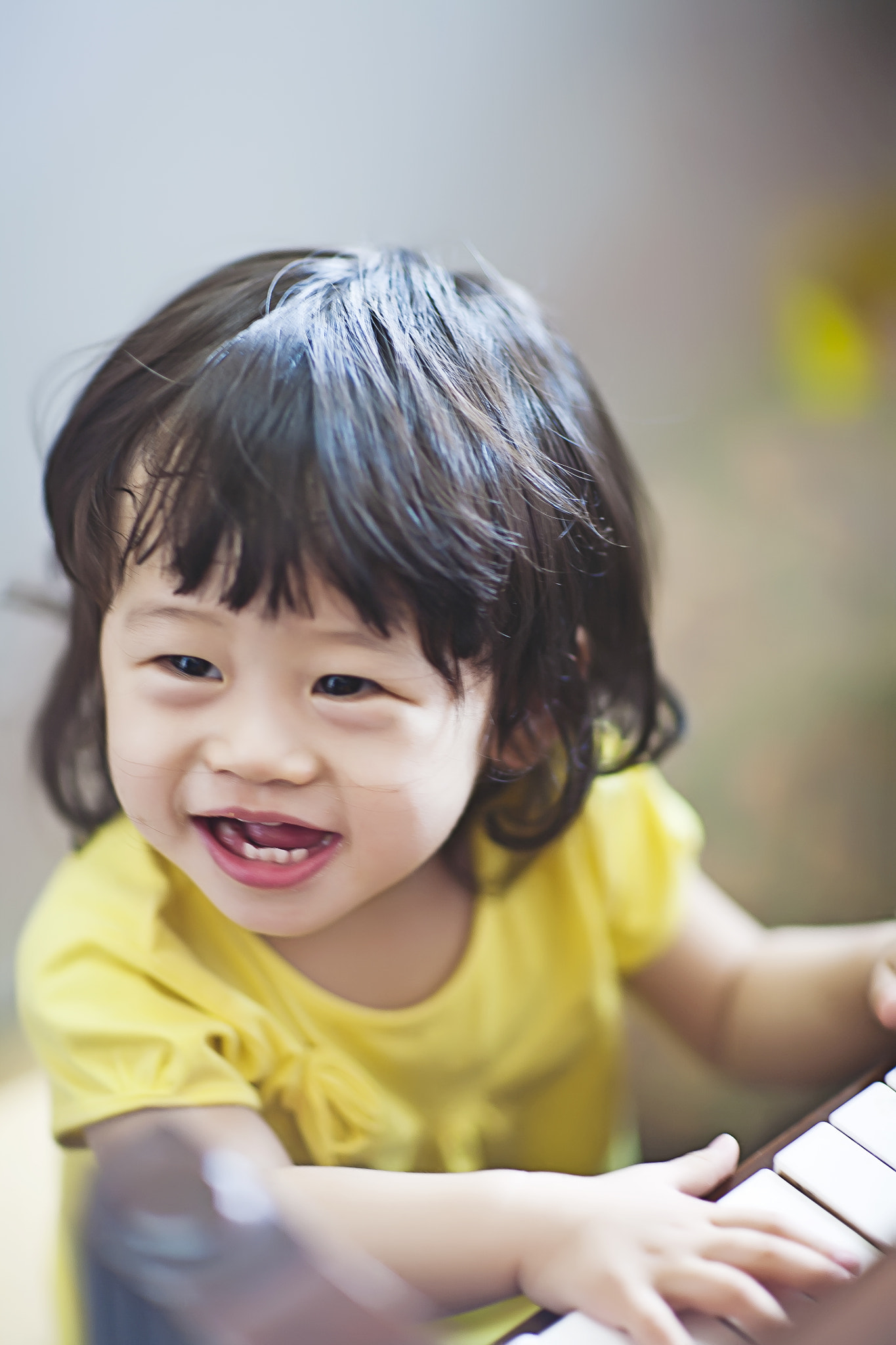 Canon EOS 5D + Canon EF 85mm F1.2 sample photo. Play the piano photography