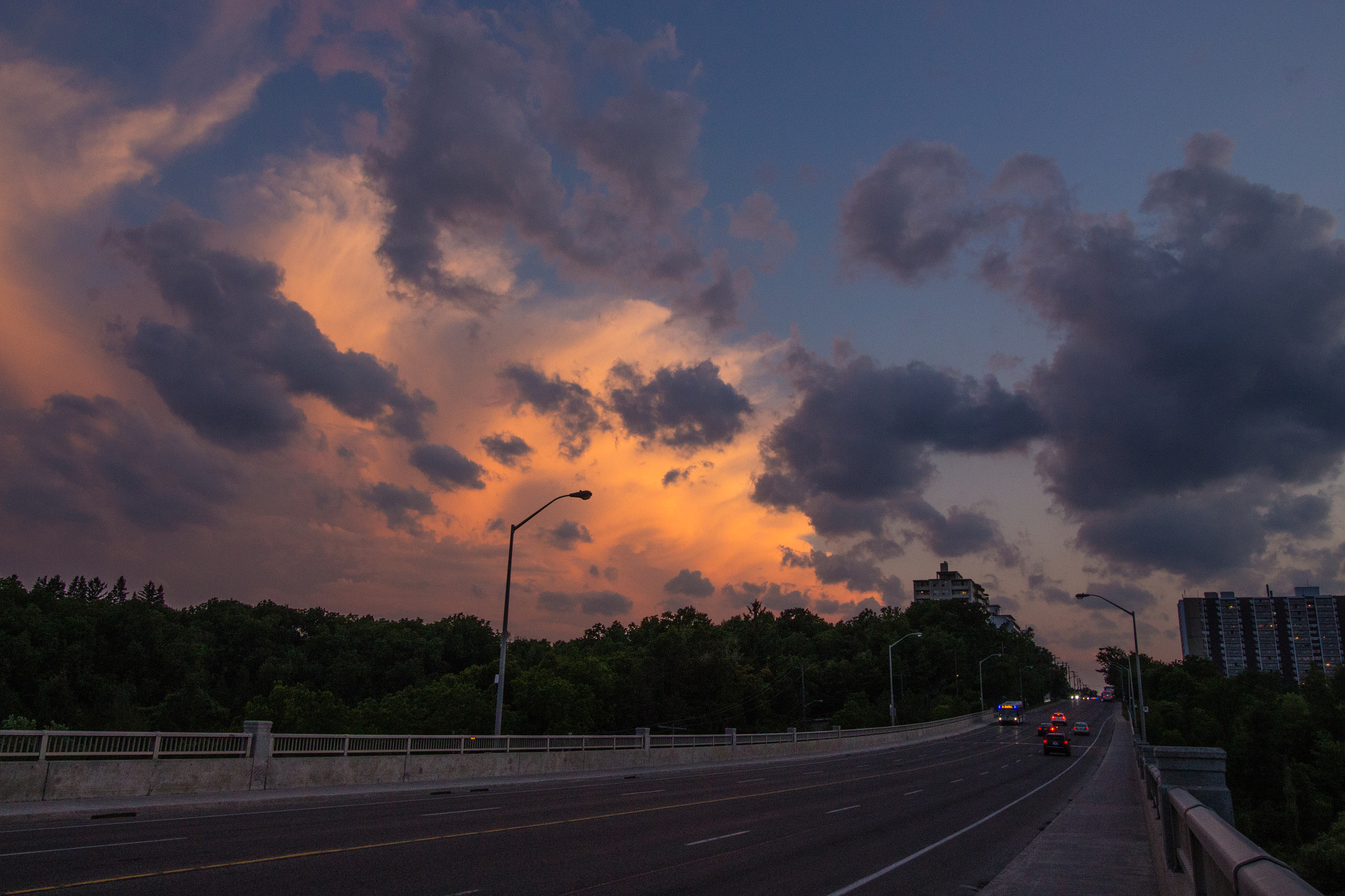 Canon EOS 700D (EOS Rebel T5i / EOS Kiss X7i) + Canon EF-S 10-18mm F4.5–5.6 IS STM sample photo. Toronto summer solstice sunset photography