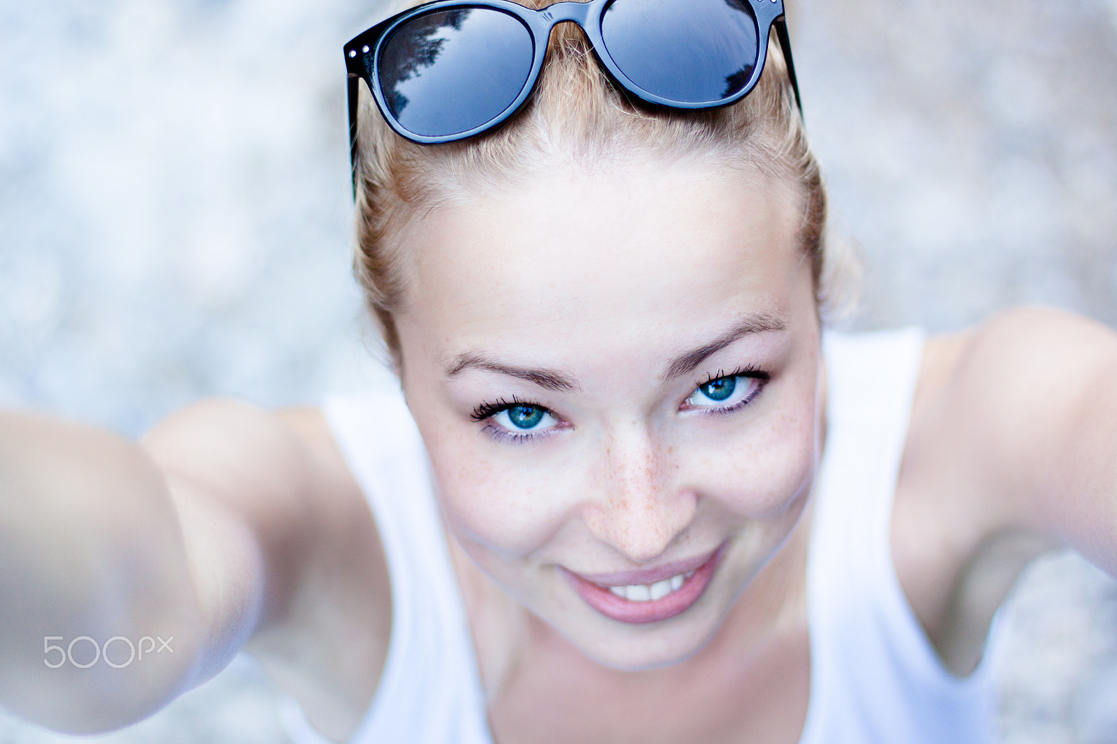 Canon EOS 50D + Canon EF 50mm F1.4 USM sample photo. Selfie of a cheerful young woman. photography