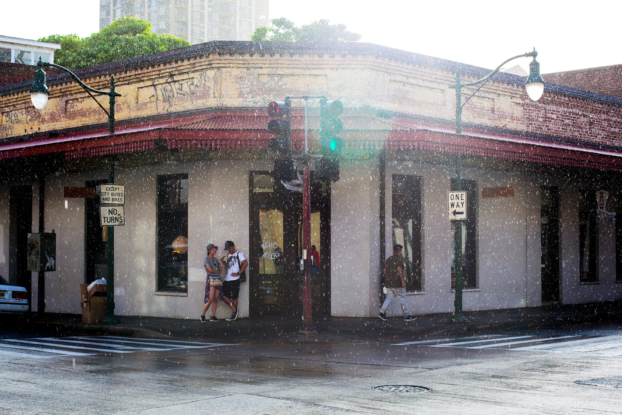 Canon EF 50mm F1.4 USM sample photo. Hotel street drizzle photography