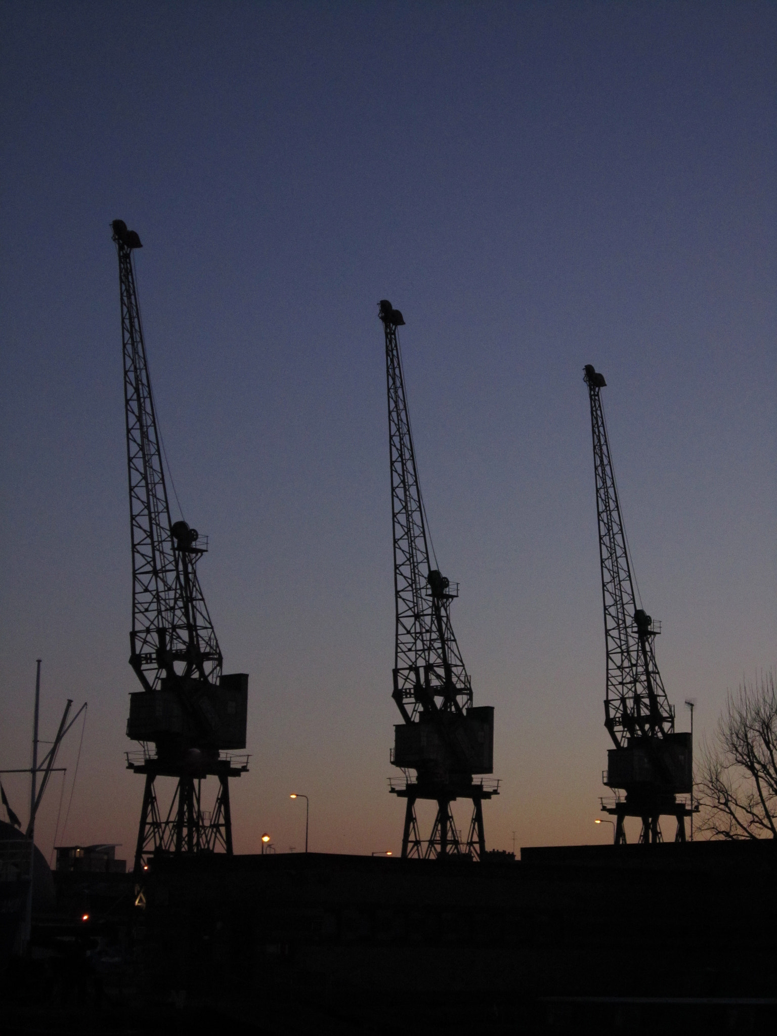 Canon PowerShot SD3500 IS (IXUS 210 / IXY 10S) sample photo. Early morning docklands cranes photography