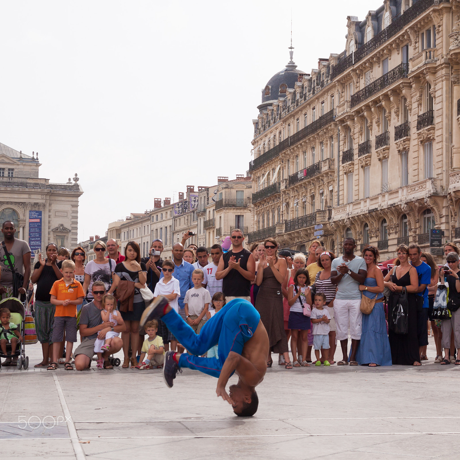 Canon EOS 50D + Sigma 18-50mm f/2.8 Macro sample photo. Street performer breakdancing on street. photography