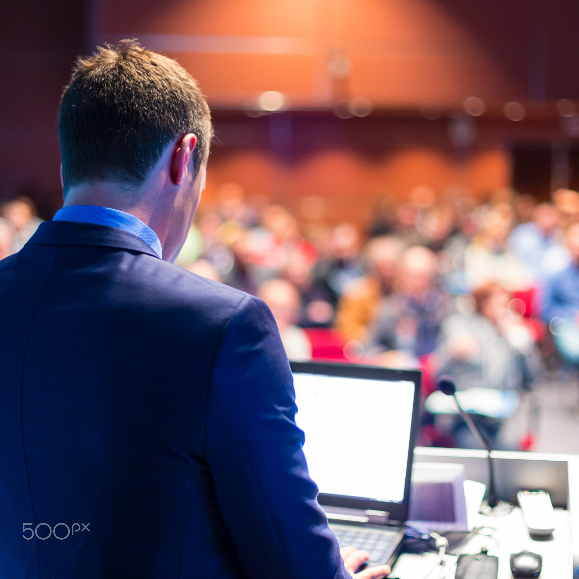 Speaker at Business Conference and Presentation.