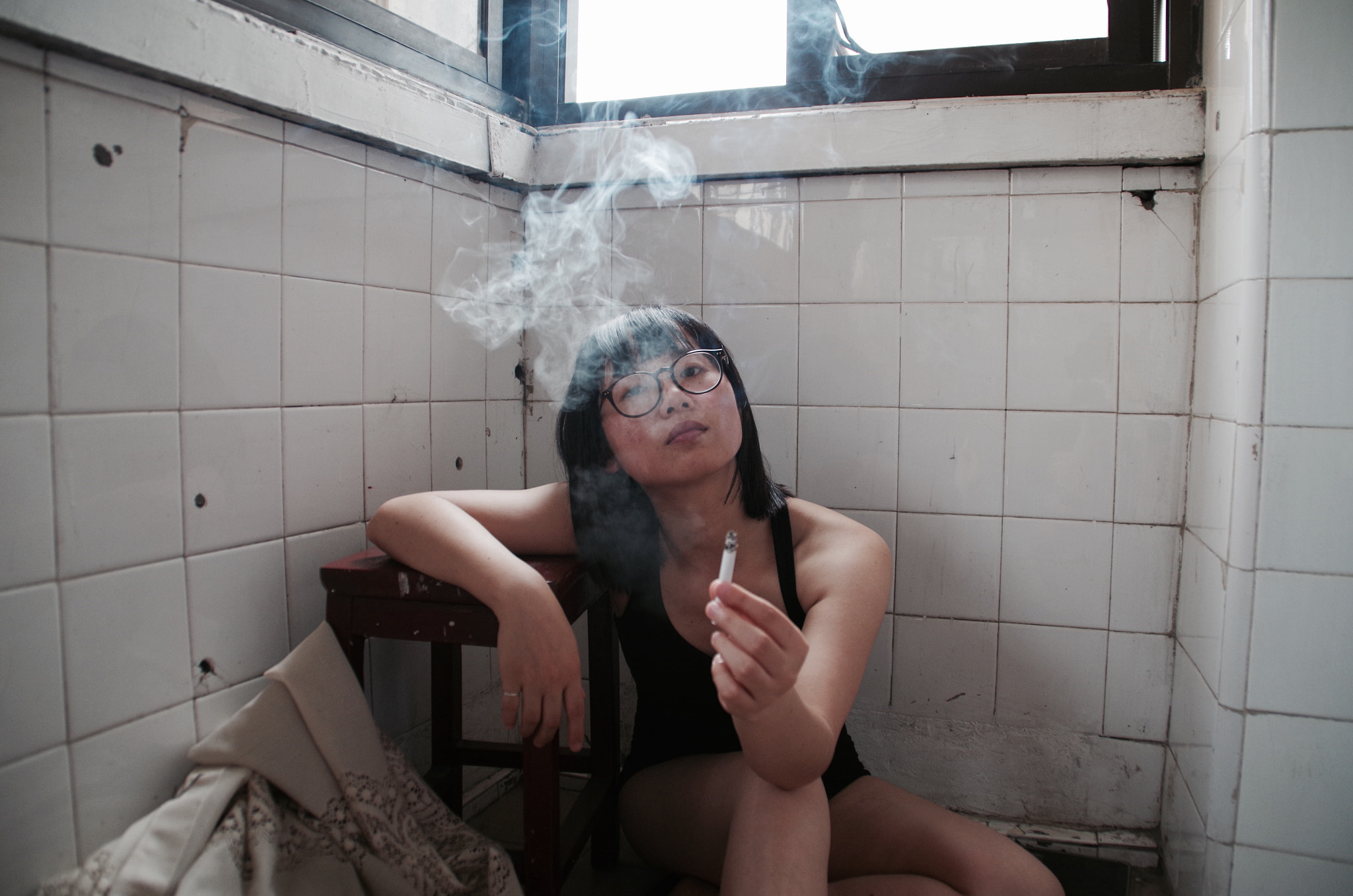 Tamron AF 18-200mm F3.5-6.3 XR Di II LD Aspherical (IF) Macro sample photo. She took a drag on her cigarette,and exhaled the smoke. photography