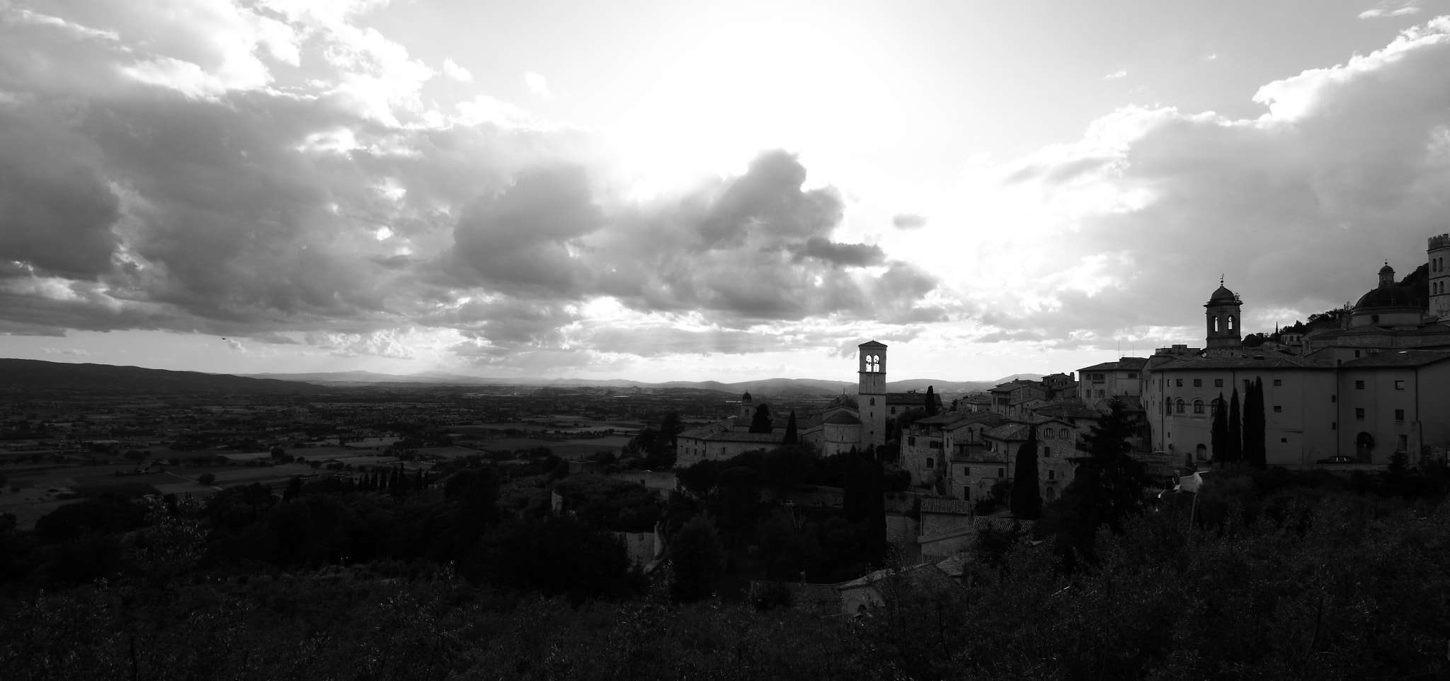 Canon EF-S 10-18mm F4.5–5.6 IS STM sample photo. The assisi and clouds photography