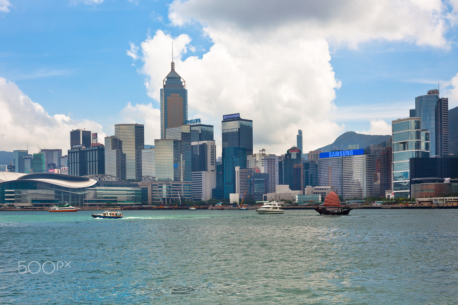 Canon EOS 5D Mark II + Canon EF 50mm F1.4 USM sample photo. Sea front view with luxurious buildings in hong kong photography