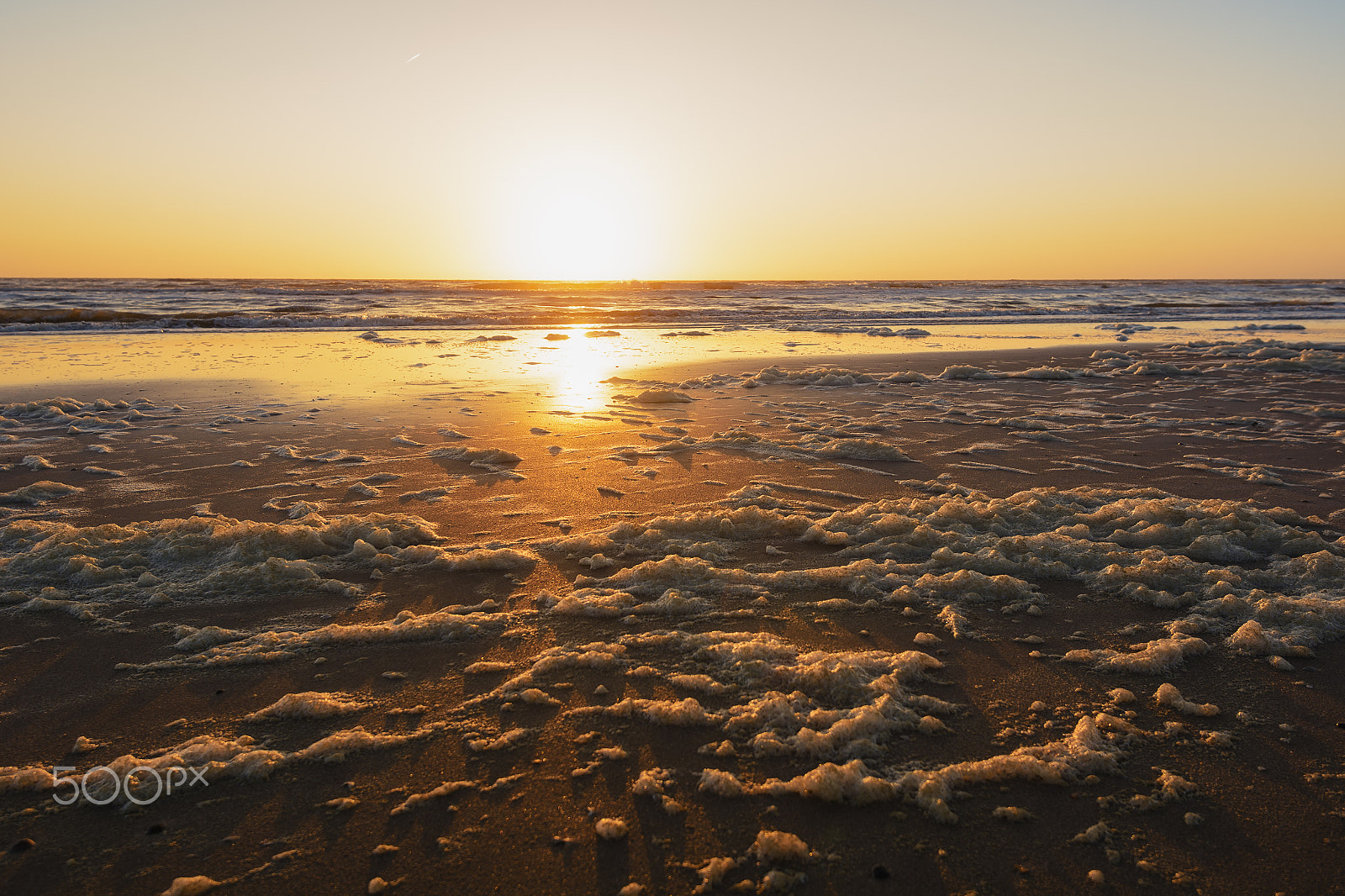 Nikon AF-S Nikkor 16-35mm F4G ED VR sample photo. Sea foam on the shore of the north sea. photography