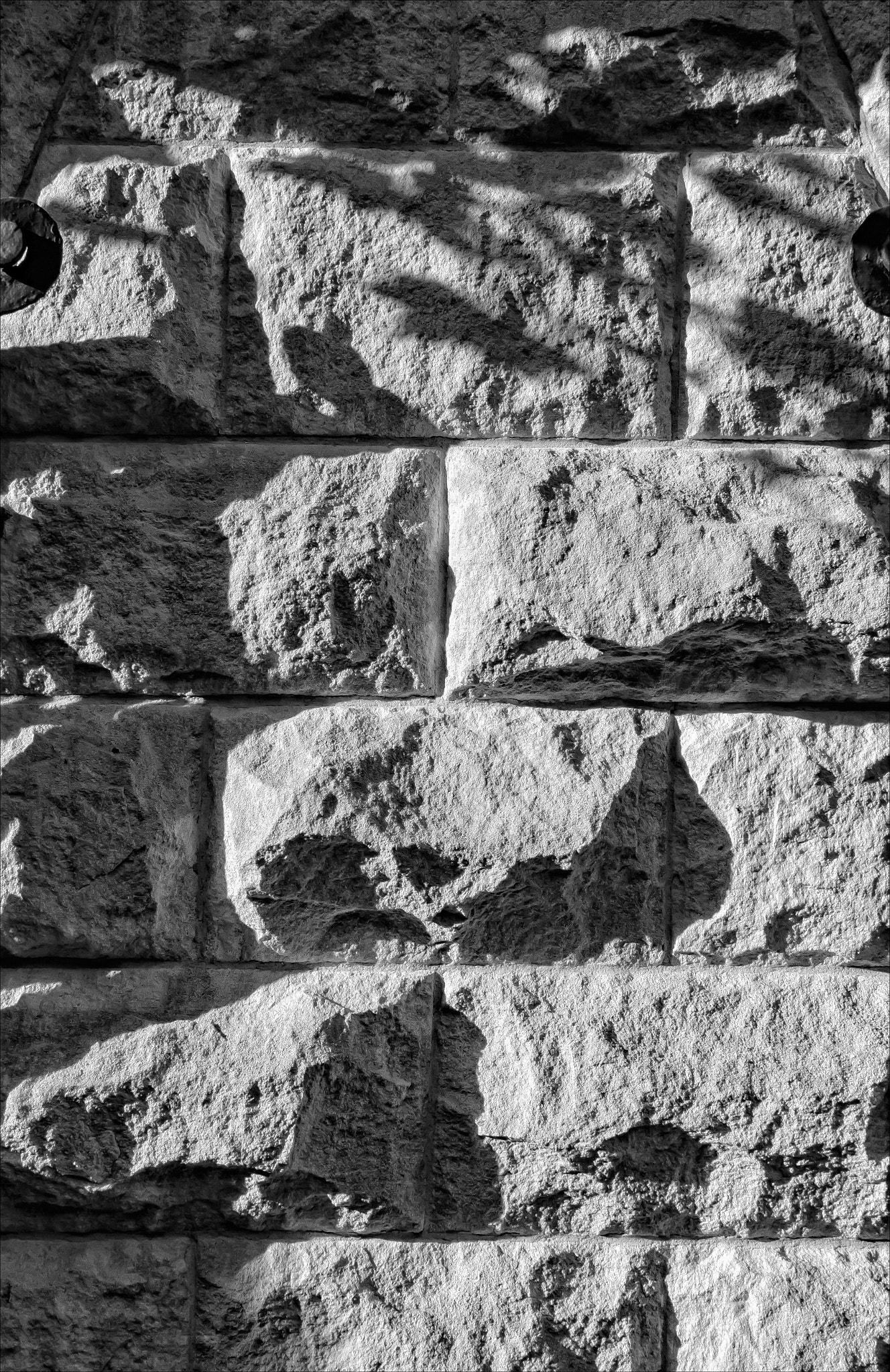 Canon EOS 60D + Canon EF 20mm F2.8 USM sample photo. Stone wall and shadows photography