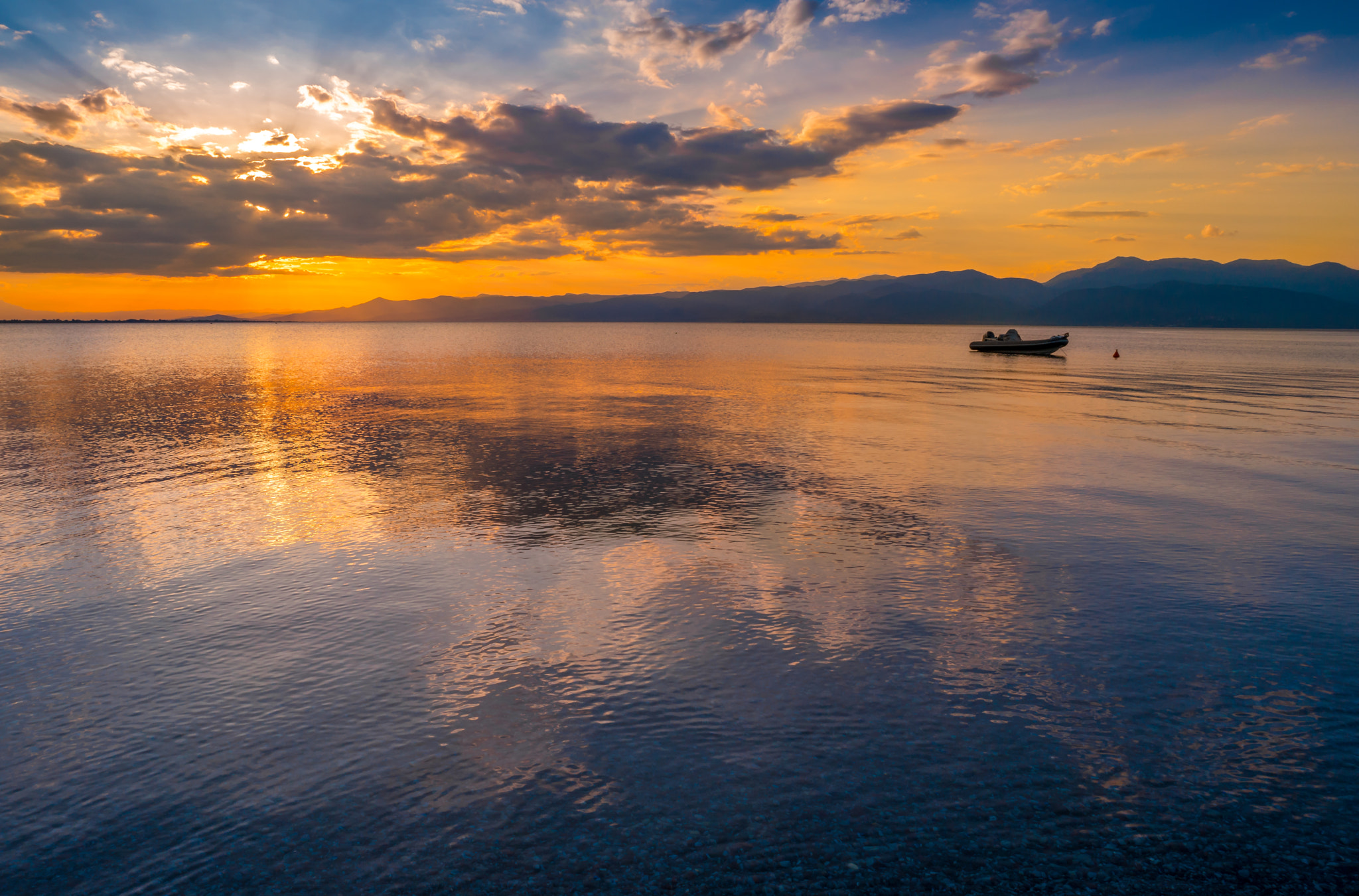 Samsung NX1 sample photo. Lonely boat in a quiet sunset photography