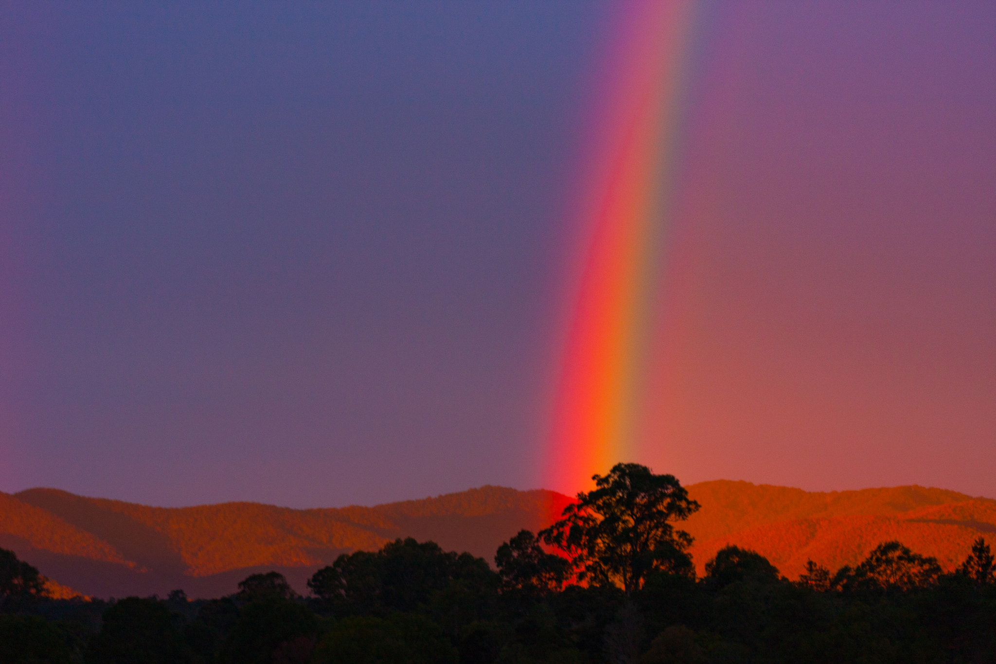 Canon EOS 40D + EF75-300mm f/4-5.6 sample photo. Rainbow across the d'aguilar range photography