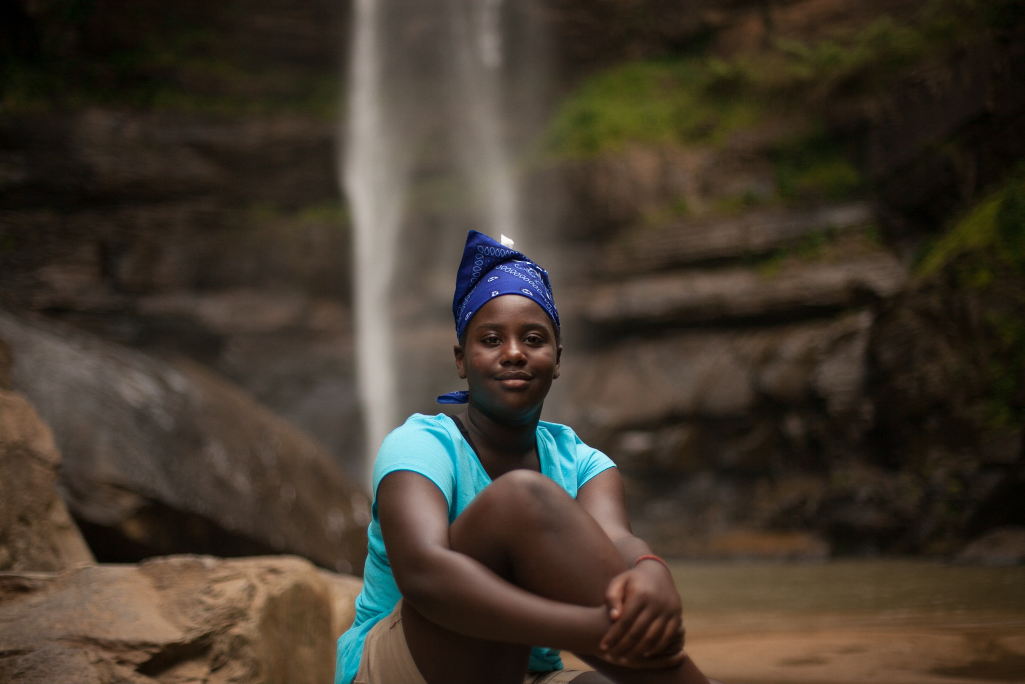 Canon EF 50mm F1.4 USM sample photo. My daughter relaxing by the waterfalls. photography