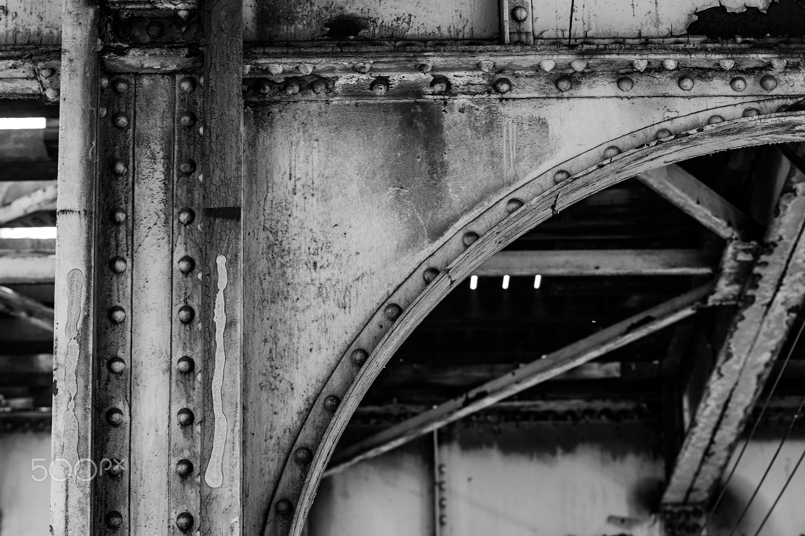 Canon EOS 100D (EOS Rebel SL1 / EOS Kiss X7) sample photo. Underneath the elevated train up close photography