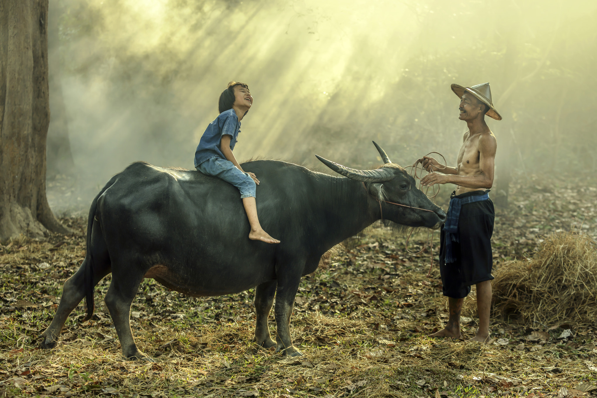Canon EF 70-200mm F2.8L IS USM sample photo. Asian farmer and his daughter ride on a buffalo photography