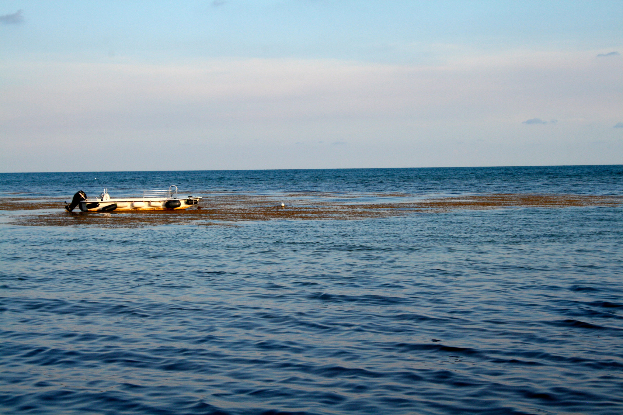 Canon EF-S 18-55mm F3.5-5.6 sample photo. Lone boat photography