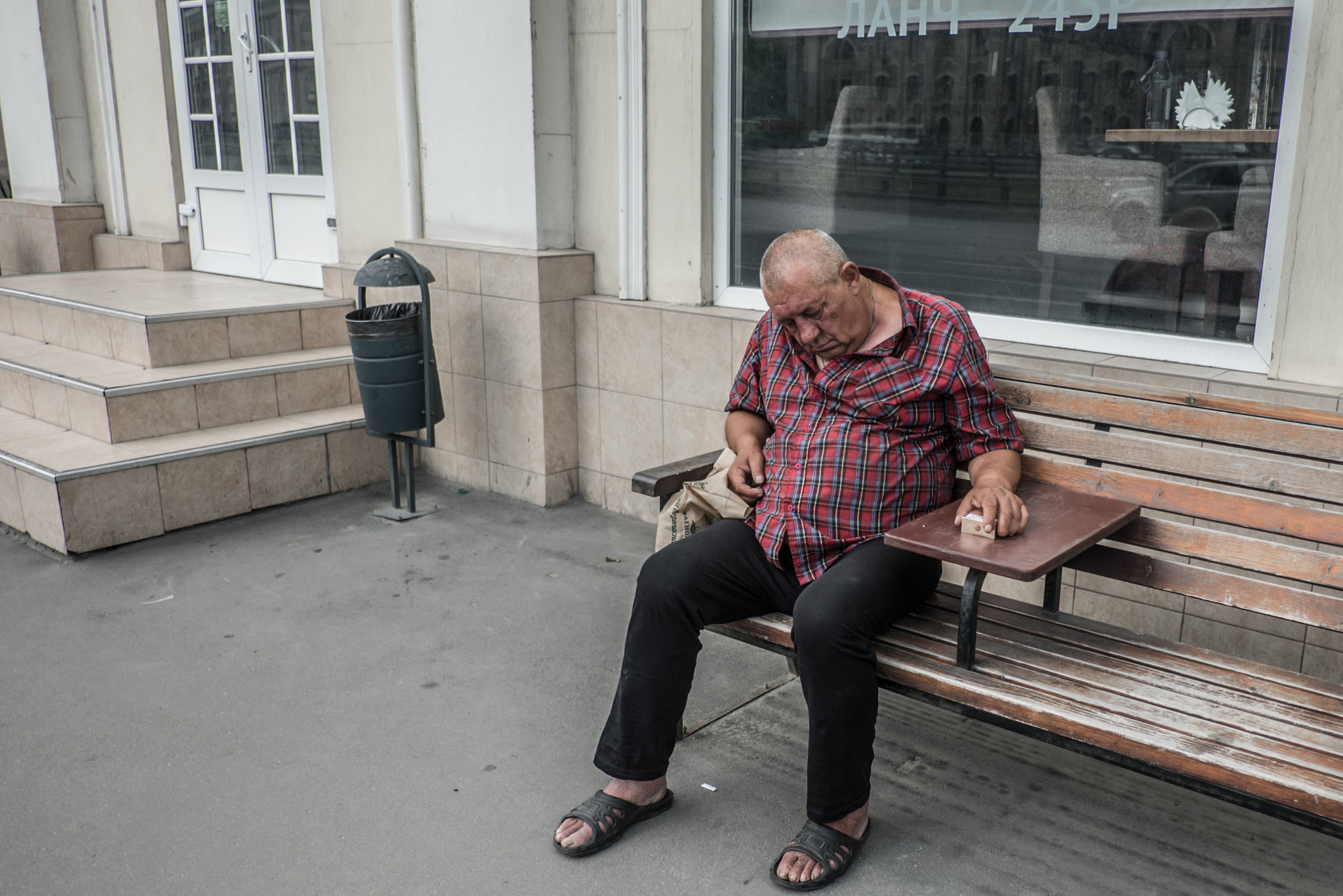 Fujifilm X-A1 + Fujifilm XF 18mm F2 R sample photo. Sleeping man photography