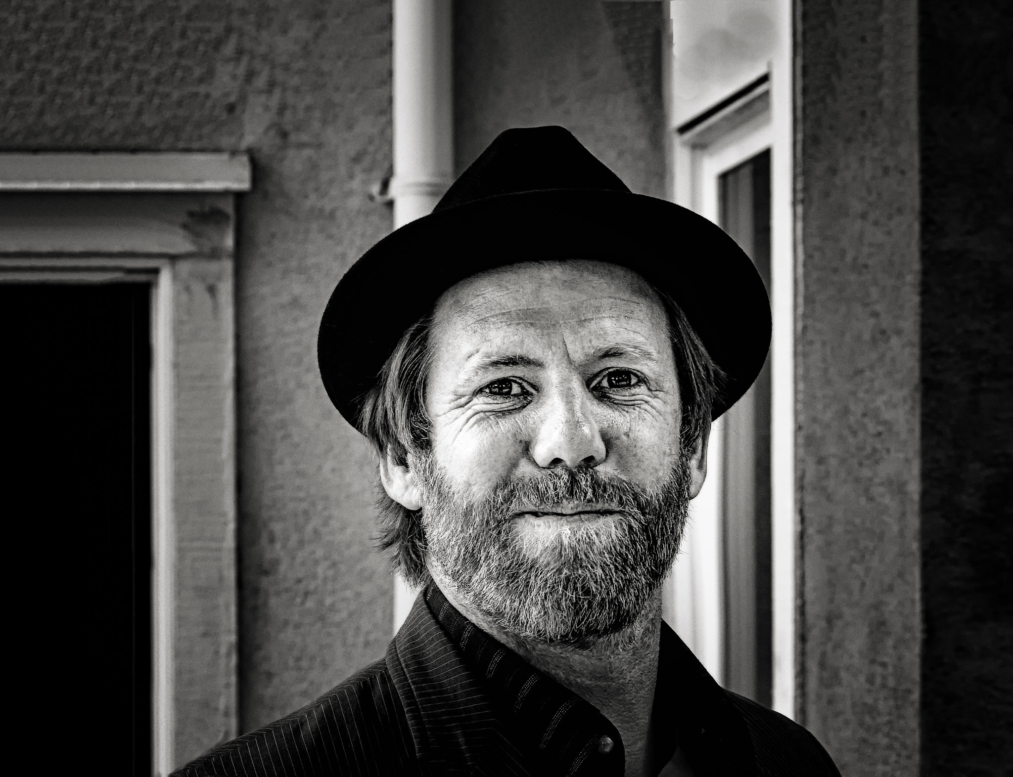 Olympus PEN E-PL1 sample photo. Man in hat with beard  photography