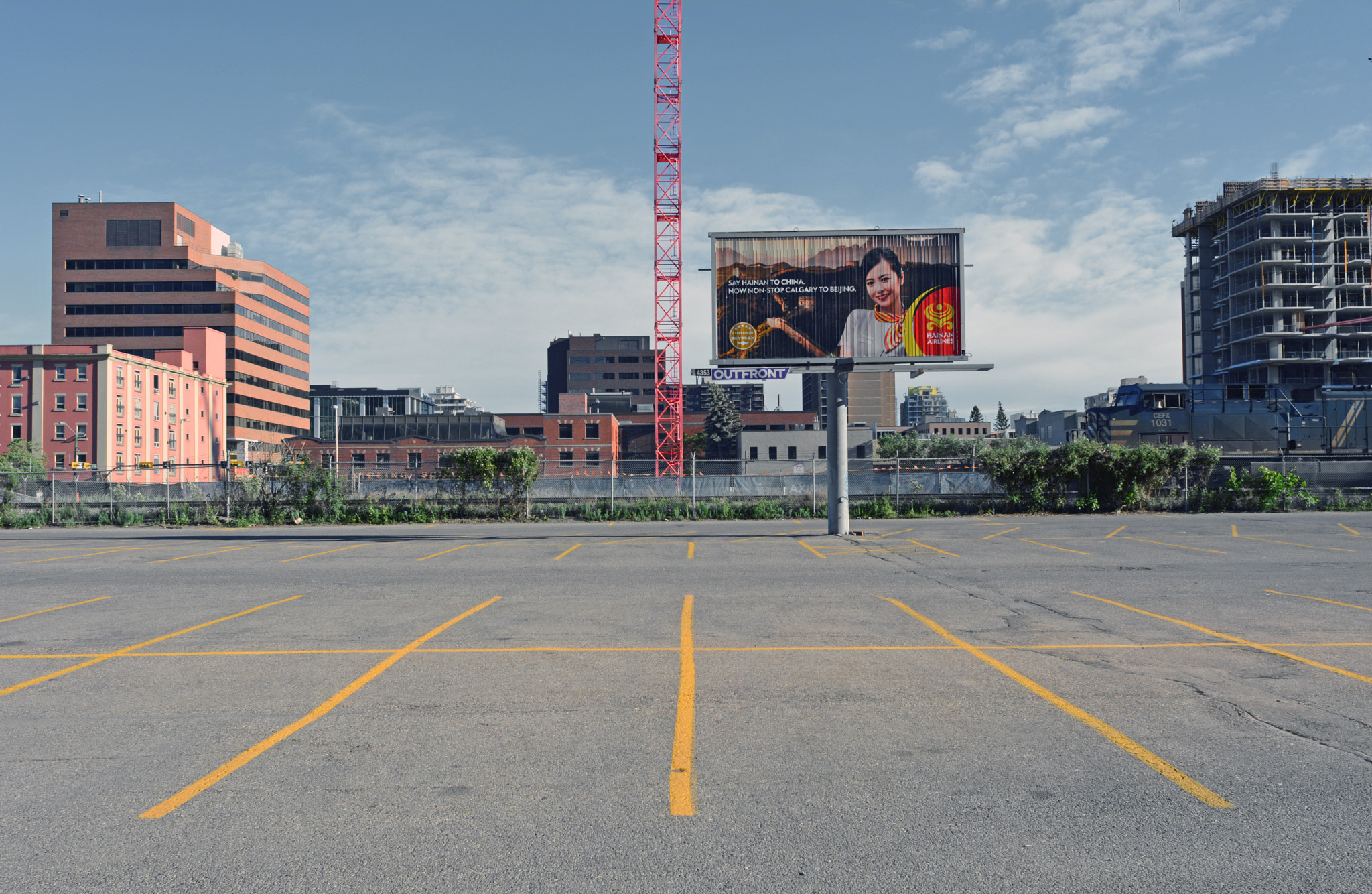 Nikon D7100 + Nikon AF Nikkor 20mm F2.8D sample photo. Parking lot on sunday, calgary photography