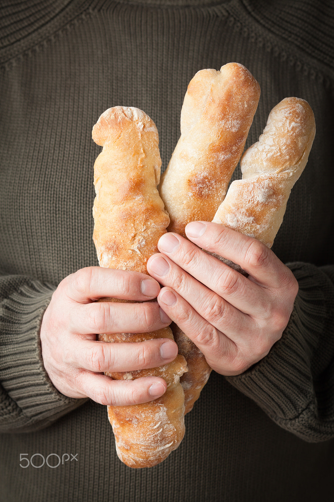Canon TS-E 90mm F2.8 Tilt-Shift sample photo. Holding baguettes photography