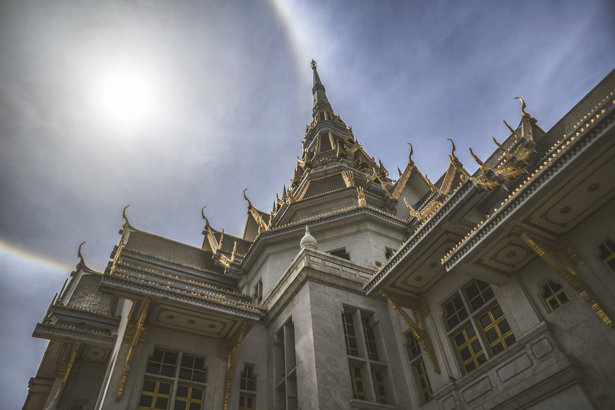 Sony a7 II + Sony E 16mm F2.8 sample photo. A great marble church with sun halo and blue sky,filtered image, photography