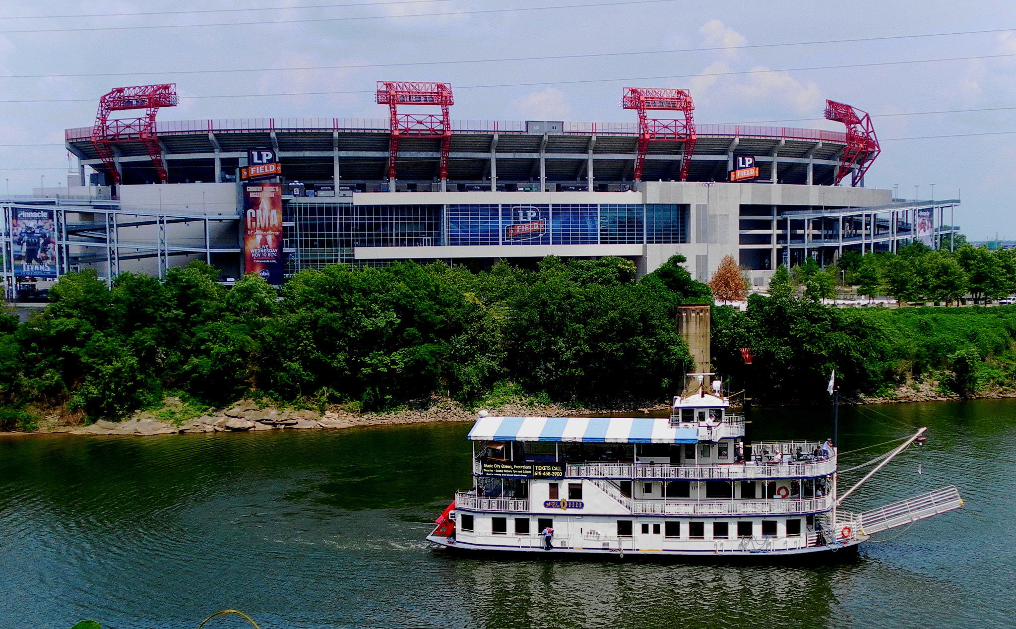 Samsung ST60 / VLUU ST60 /  TL105 /  ST61 sample photo. River boat by stadium photography