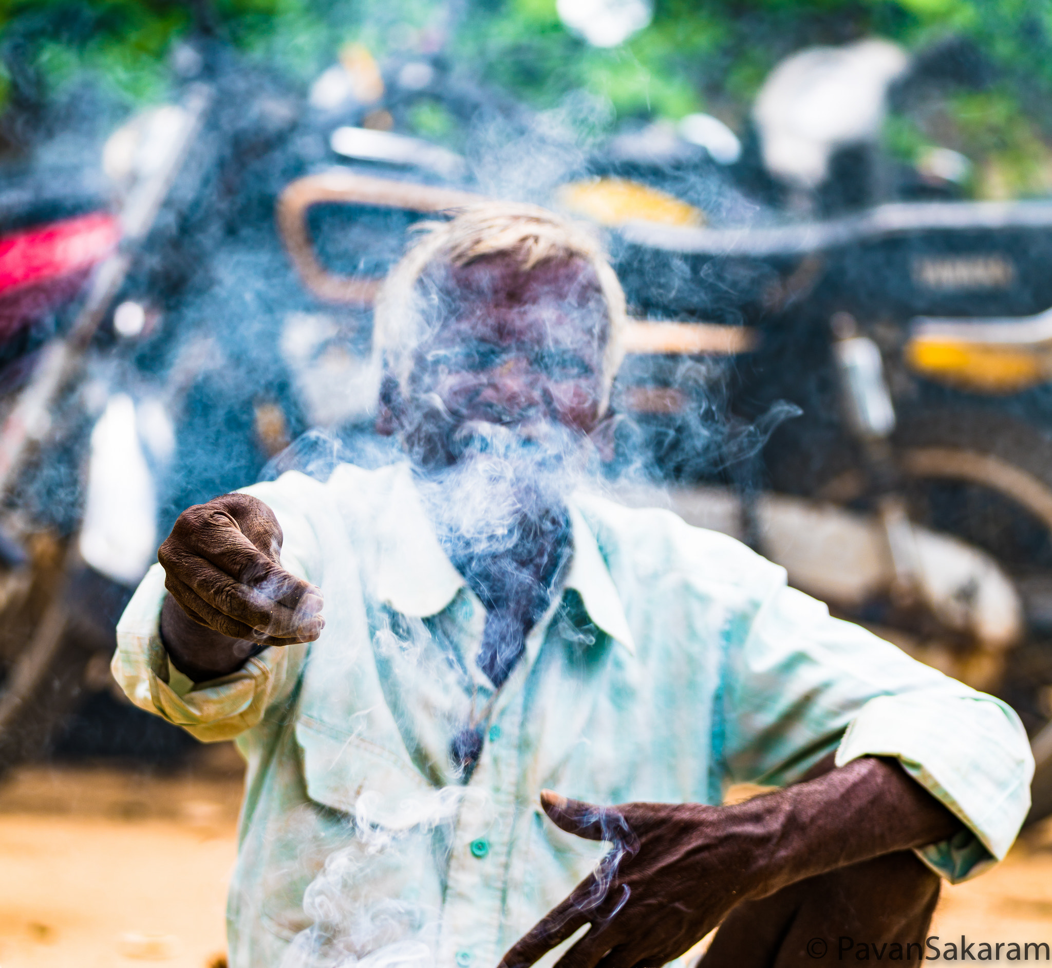 150-600mm F5-6.3 DG OS HSM | Contemporary 015 sample photo. Smoke man photography
