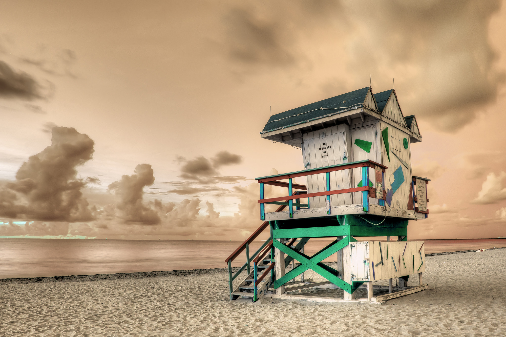 Nikon D600 sample photo. Multicolor lifeguard tower (brown sky) photography
