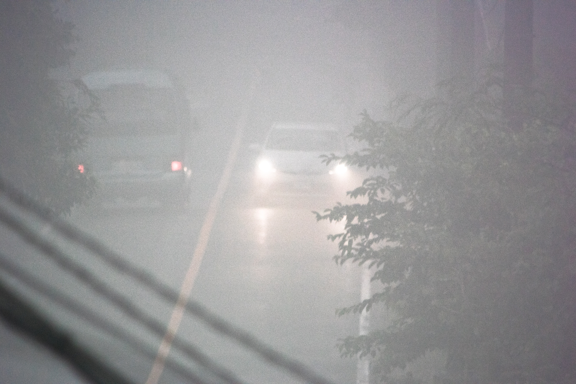Nikon 1 V3 sample photo. Headlight in the mist photography