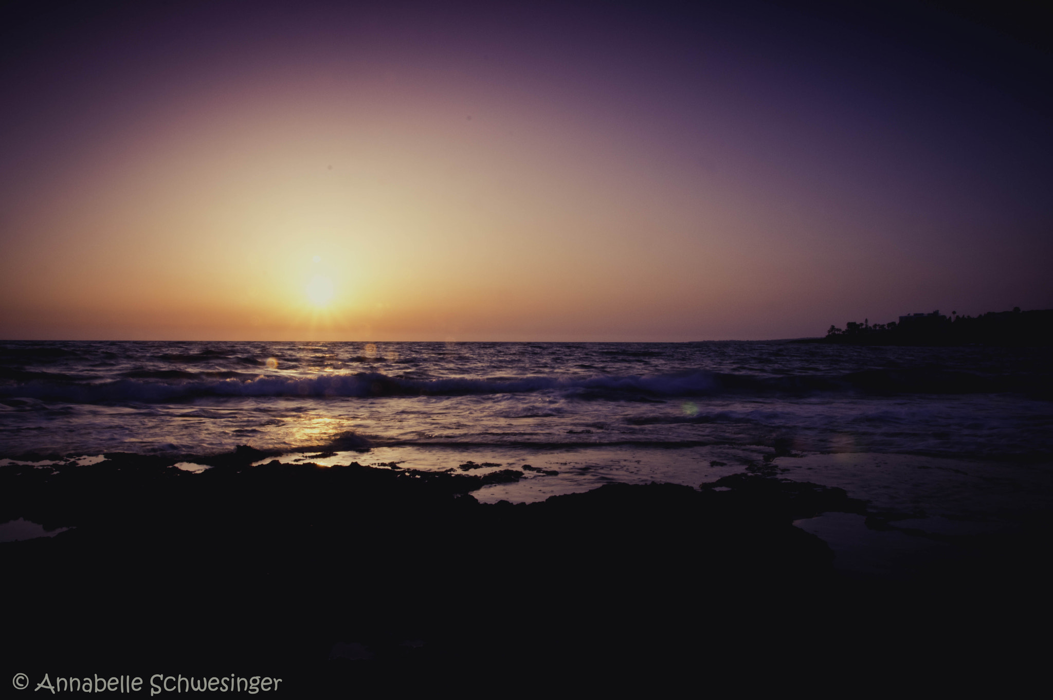 Sigma 17-70mm F2.8-4 DC Macro OS HSM sample photo. Sun diving into the ocean photography