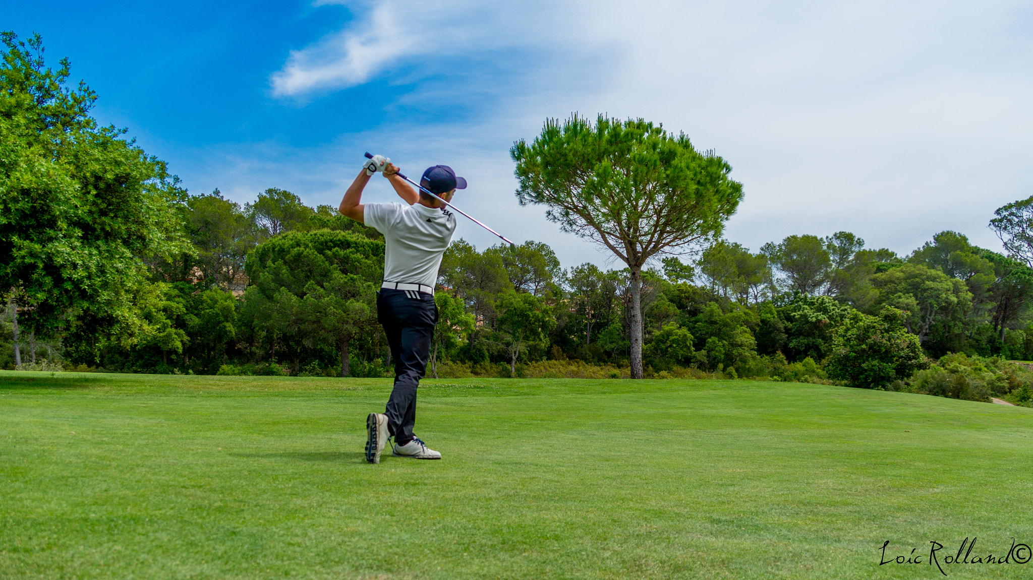 Sony E 18-200mm F3.5-6.3 OSS sample photo. Golf photography
