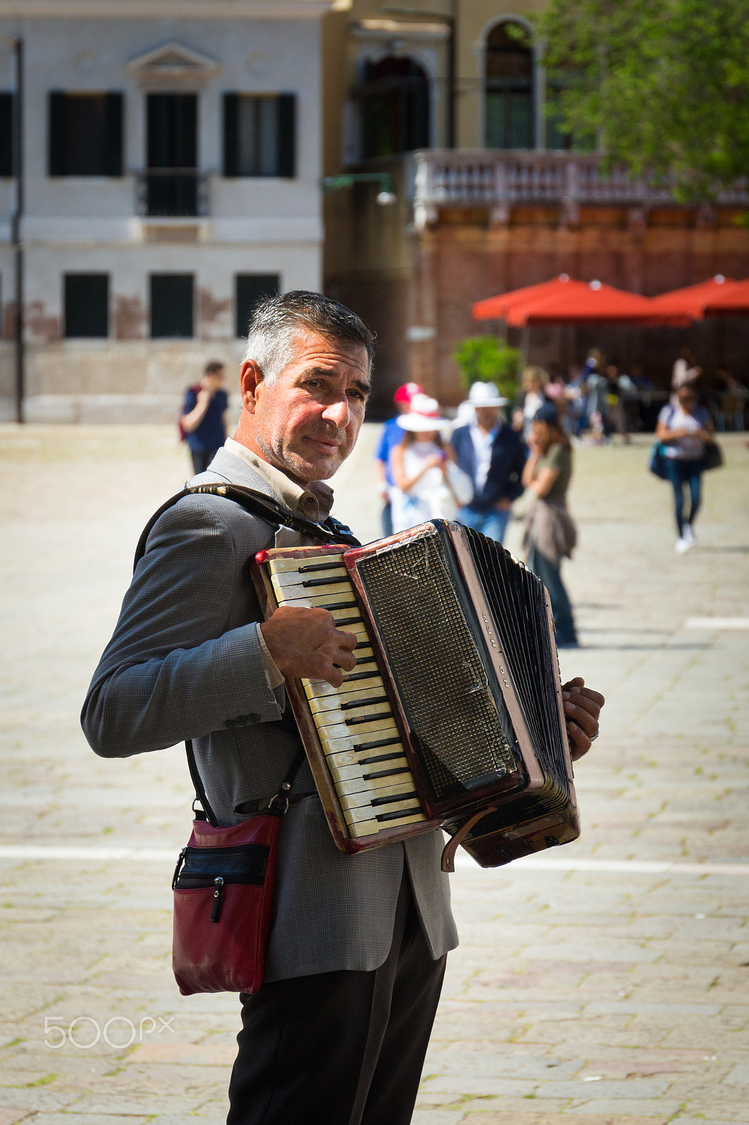 Canon EF 24-70mm F4L IS USM sample photo. Street musician photography